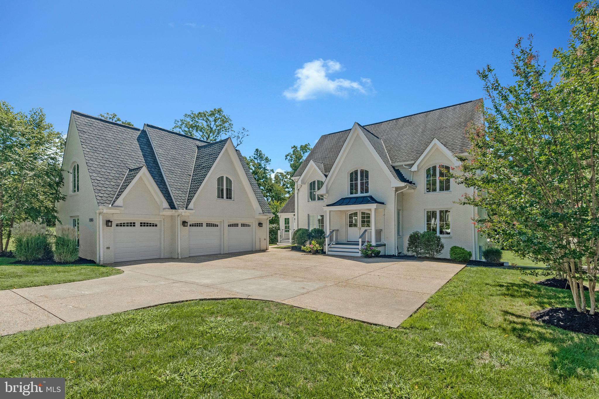 Don't Miss the Video Walk-Through***Exceptional all-brick colonial, thoughtfully and completely rebuilt in 2007 with timeless design, quality craftsmanship, and luxury throughout. Total put into the house, garden and garage was $2,085,000. Set on a beautifully landscaped lot, this expansive residence offers over four finished levels of living space, a detached 3-car garage with an upper-level storage loft, and an extraordinary resort-style backyard perfect for both relaxation and entertaining. The outdoor space is a true retreat, featuring a sparkling, oversized pool, three large patios ideal for lounging and dining, a spacious screened-in porch with a stone fireplace just off the family room, and a gorgeous elevated deck overlooking the grounds. A separate screened-in gazebo—complete with its own fireplace—adds to the charm and comfort, creating an inviting space for year-round enjoyment. Step inside to a grand main level with an open foyer that flows into a formal dining room—perfect for hosting guests—and a private den/home office. The heart of the home is the beautifully appointed gourmet kitchen, equipped with a large center island, high-end appliances, custom cabinetry, and an adjoining sunroom that floods the space with natural light. The expansive family room offers a warm and welcoming atmosphere, ideal for everyday living and entertaining. 
The upper level features a spacious primary suite with a private sitting room, a luxurious en-suite bath with double vanities, soaking tub, separate shower, and a massive walk-in closet. Two additional bedrooms on this level also include walk-in closets and share access to a well-appointed full bathroom. The third level offers tremendous flexibility with two additional oversized bedrooms featuring charming skylights, along with a full bath—ideal for guests, a home studio, or extended family. The walk-out lower level offers an impressive amount of finished space, including a large recreation room, game room, sixth bedroom, full bath, dedicated laundry area, and a generously sized storage room. From here, step directly out to one of the patios and enjoy seamless indoor-outdoor living. Ideally located in a peaceful setting, yet convenient to main commuter routes, top-rated schools, shops, dining, and parks, this exceptional home blends elegant interior spaces with a resort-like exterior. ***PORCH, DECK, LAWN AND POOL CABANA FURNITURE CONVEYS***