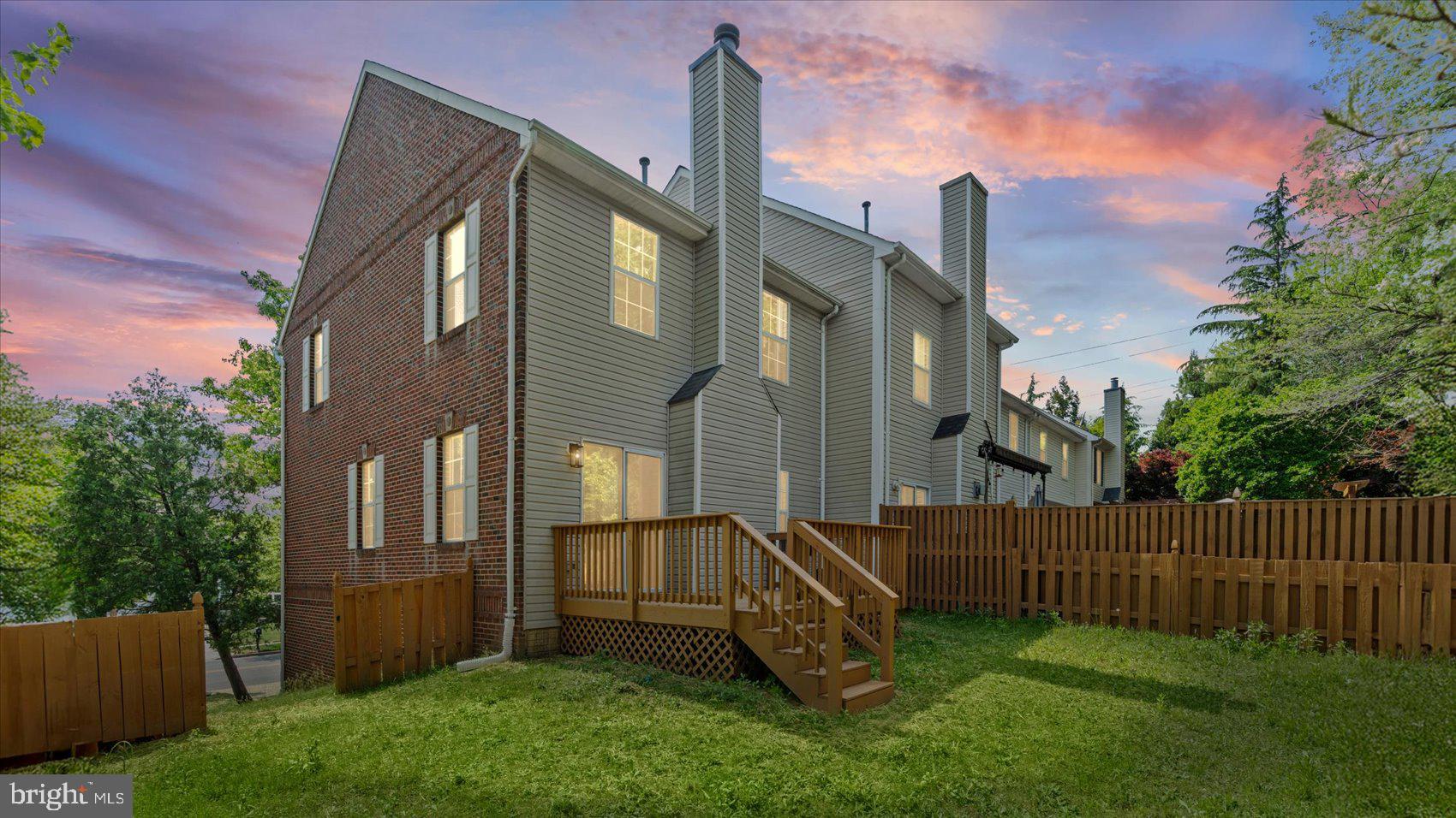Beautifully renovated townhouse in Bowie featuring a bright, open floor plan and premium finishes. The main level boasts a gourmet kitchen with sleek countertops and stainless steel appliances, flowing seamlessly into the spacious living area. The upper level offers three bedrooms, including a primary suite with a walk-in closet and private spa-like bath. A fully finished walk-out lower level adds a large recreation room and a third full bath. Enjoy the private, fenced backyard from the oversized deck. Attached garage and move-in ready. Perfectly designed for modern comfort.