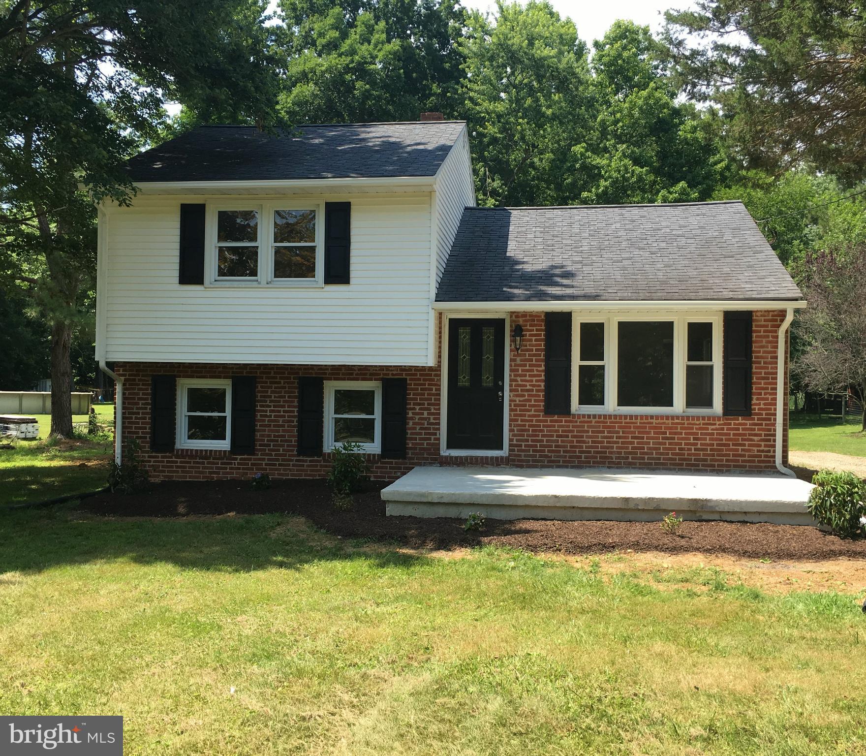 Nicely rehabbed bi-level ready to move in! Featuring a huge kitchen / dining room area, this 3 bedroom 1 bath property is perfect for first time home buyers or someone looking to downsize. All new kitchen with granite and stainless, and neutral paint throughout that will adapt to almost any style. Situated on over an acre and a half, mostly wooded lot. See it today before it's gone!