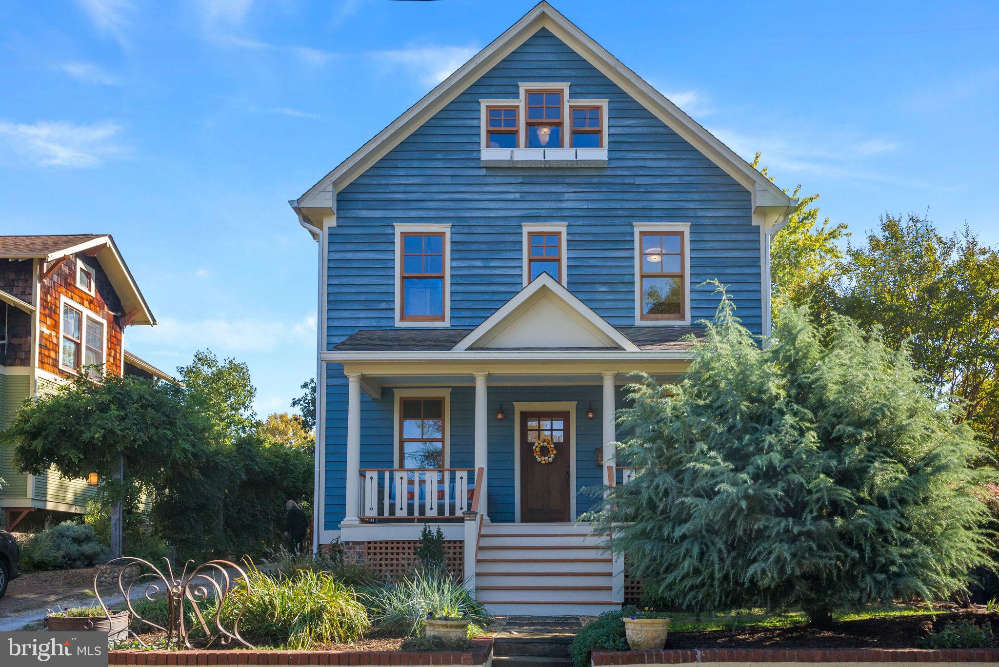 Welcome to 2409 Davis Avenue, a beautifully expanded bungalow in the heart of Braddock Heights, one of the most sought-after neighborhoods in the area. This home has been thoughtfully transformed from a cozy bungalow into a spacious four-story retreat—perfect for modern living while still retaining its original charm. Over the past 25 years, over $600,000 has been invested in updates, including new windows, framing, floors, and more. You’ll love coming home to this thoughtfully designed space.
You'll feel at home when you step onto the charming front porch. The open main level is bright and welcoming, with abundant natural light, 10-foot ceilings, arched doorways, and gorgeous hardwood floors. The family room with a cozy fireplace is the perfect spot to unwind after a long day. The kitchen is a true centerpiece, featuring a large center island with a breakfast bar, stainless steel appliances, granite countertops, and a sunny breakfast nook to enjoy your morning coffee. With a main-level bedroom option and a convenient half bath, this home offers flexibility for your lifestyle. Upstairs, you’ll find spacious bedrooms on the second and third floors, all sharing an updated hallway bath. The primary suite is a true retreat with a walk-in closet, an ensuite bath with double vanities, a soaking tub, and a walk-in shower. The third floor is a highly versatile space that is excellent for use as a bedroom, a studio, or a combo, even as a play area/rec space. Don’t forget about the full basement—a perfect escape for peaceful movie nights in the finished area, offering a cozy spot to relax and unwind. The unfinished portion provides a spacious laundry area and extra storage, keeping everything neatly tucked away. The outdoor space is just as inviting as the inside. Whether relaxing on the front porch, hanging out by the firepit on the patio, or enjoying a peaceful evening on the back deck, there’s plenty of room to enjoy the outdoors. Plus, there’s a shed for all your outdoor tools, off-street parking for two cars, and plenty of additional street parking.
The location couldn’t be better—you’re just a mile from Del Ray, three miles from Old Town, and only 10 minutes from the Pentagon, with easy access to everything the city offers. If you’re looking for a home that’s been carefully expanded to accommodate all your needs while still maintaining its original character, 2409 Davis Avenue is the one for you!