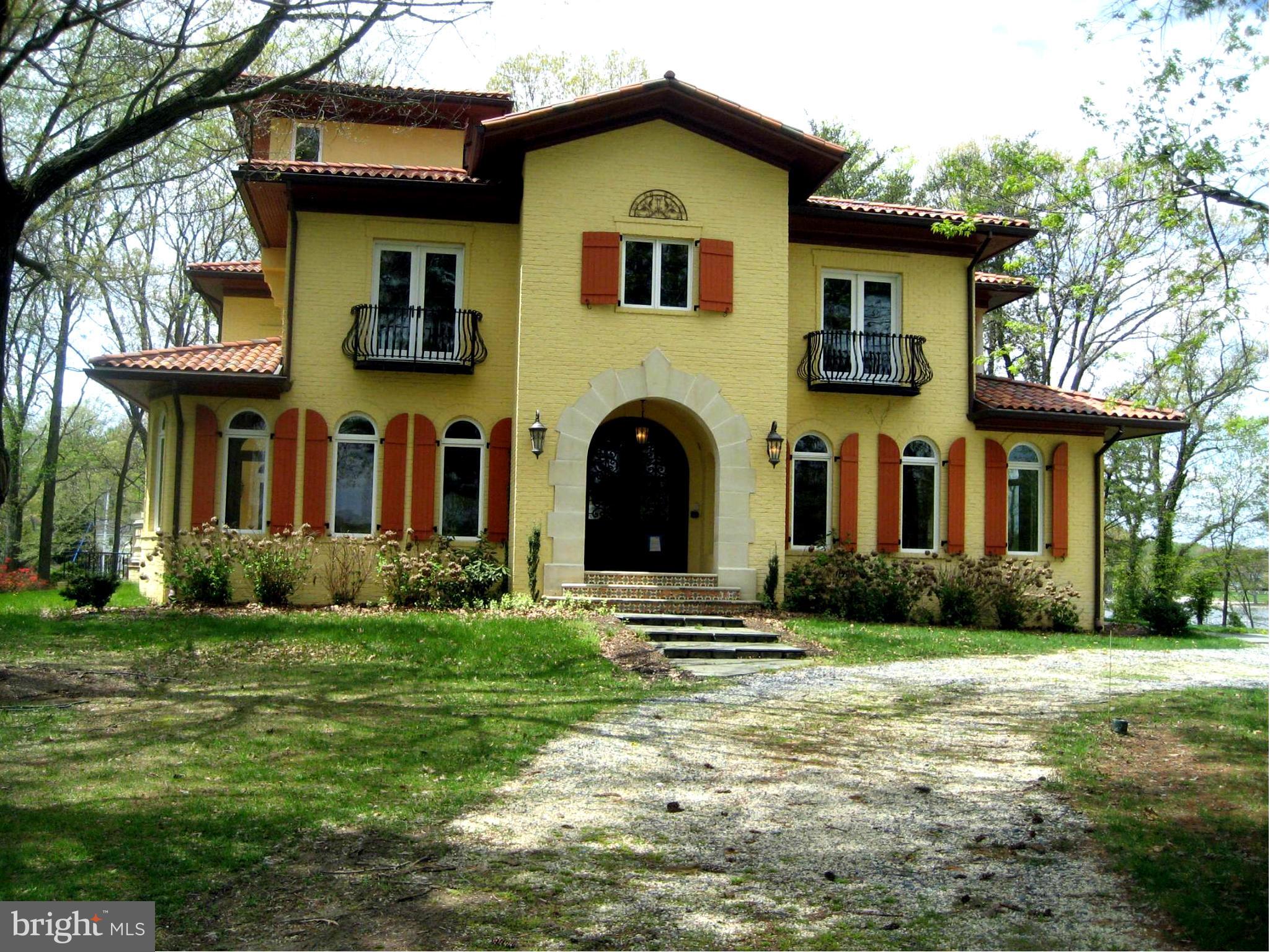 Gorgeous CUSTOM home on private 1.15 acre Whitehall Creek lot w/ 3-car garage. Everything you'd expect w/ gourmet KIT, hand-worked floors, imported tile, custom iron work & mantels, etc.  Home further boasts BSMT wet bar, billiards room, home theater.  Tremendous outdoor space w/ multiple terraces, Juliet balconies, flat lot & deep water pier.  Perfect for entertaining! AGENTS- SEE GENERAL REMARKS