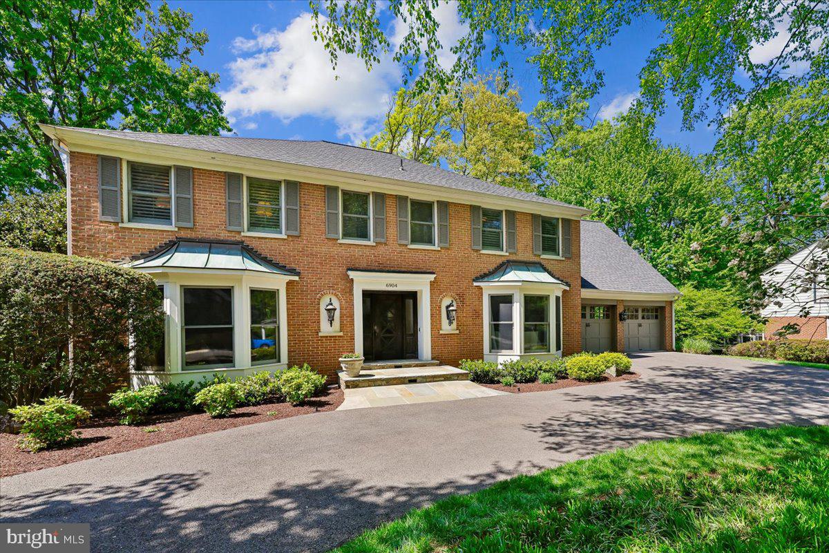 Better-than-new in North Bethesda! Stunning renovated colonial in sought-after Windermere enclave.  From the landscaped grounds, on a large corner lot, to the circular driveway to the flagstone walkway, the home has an elegant presence from the start.  Once inside, the vibe is timeless and classic.  The foyer opens to a dramatic staircase with designer bannister.  The coveted main floor office/den is just off the foyer providing that perfect WFH spot, or a cozy corner for that mah jongg game.  Across the foyer is the elegant dining room, ready for special occasions with family and friends.  Just beyond is the true sweet spot. The wide-open floor plan includes the gourmet chef’s kitchen, a true masterpiece designed by acclaimed kitchen design firm, Lobkovich.   High-end appliances include a Viking Professional six burner range, two dishwashers, a Dacor warming drawer, SubZero refrigerator with two freezer drawers, and more. In the bar area, there are two refrigerated beverage drawers. In the warmer months, enjoy life on the screened porch and deck, like living in your own tree house.  Back inside, rounding out the main level are the family room, with a gas fireplace, and an amazing mud room with newer washer and dryer, cubbies, storage and access to the freshly painted garage.  Upstairs, you’ll find five bedrooms and three full baths, including a sumptuous primary suite, with a wood-burning fireplace, two walk-in closets and a spa-like primary bathroom.  The walk-out lower level is huge, with open space, a guest room/bonus room, a full bath and so much storage.   With hardwood floors throughout the main and upper levels (including under the carpet in upstairs bedrooms), and decorator touches everywhere you look – every door knob has been replaced in this home! -- this home is truly one-of-a-kind and move-in ready.