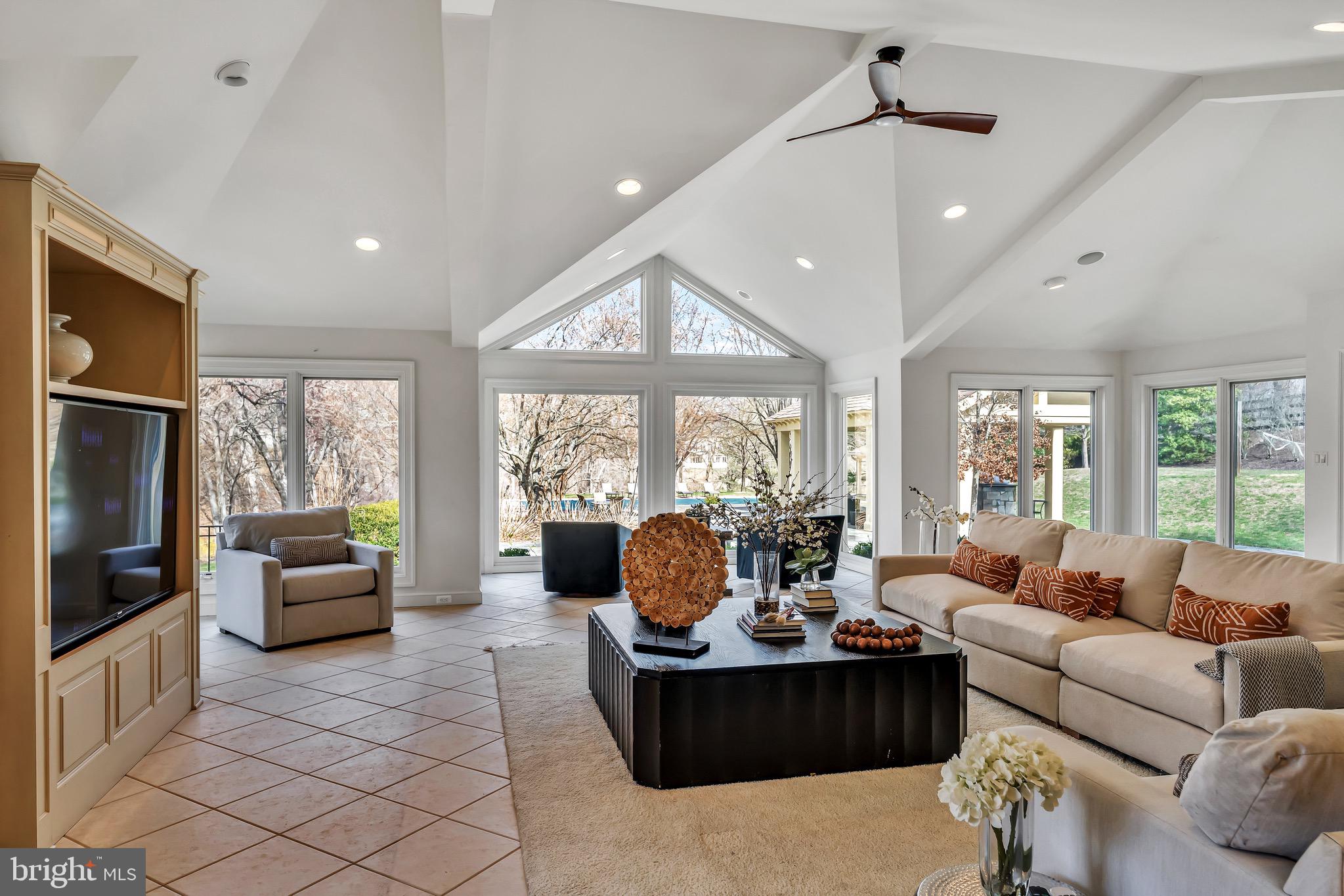NEW PRICE!!! Welcome to 12212 Drews Ct, a magnificent residence nestled on a sprawling 2.6-acre estate in the prestigious enclave of Potomac, Maryland. This distinguished property seamlessly blends timeless elegance with modern sophistication, offering an unparalleled living experience tailored for discerning luxury buyers and families alike.
<br>
Refined Interiors for Grand Living
<br>
Upon entering, you're greeted by an inviting foyer that sets the tone for the home’s refined ambiance. The formal living room, adorned with a cozy fireplace, and the stately dining room with built-in sideboards, provide the perfect settings for intimate gatherings and grand soirees. A chic, custom-built office caters to the needs of the modern professional, ensuring both comfort and productivity.
<br>
At the heart of the home lies the gourmet eat-in kitchen, a culinary masterpiece equipped with high-end appliances and dual center islands. Designed to inspire, this space offers ample room for culinary exploration and casual family meals, all while overlooking the picturesque grounds.
Luxurious Private Sanctuaries | 
The upper level boasts six generously sized bedrooms and three full baths. The primary suite is a sanctuary of relaxation, featuring a spacious walk-in closet and a spa-like en-suite bath, providing a serene retreat from the day’s demands. An Entertainer's Dream Lower Level - The expanded walk-out lower level is an entertainer’s dream, offering a large recreation room with a fireplace, built-ins, and a wet bar. Additional spaces include game rooms, an at-home gym, and multiple storage rooms, ensuring every need is met with style and convenience.
<br>
An Outdoor Oasis Beyond Compare
<br>
The exterior of the property is nothing short of spectacular. A generously sized patio overlooks the vast, meticulously landscaped grounds, creating an idyllic setting for outdoor entertaining. The estate features a pavilion with a gas fireplace, a built-in grill, a volleyball court, a sparkling pool with a separate cabana house, and a playground, crafting a private oasis for relaxation and recreation.
<br>
Prime Potomac Location
<br>
Ideally situated near River Road, this estate offers convenient access to the finest amenities the DMV area has to offer, including top-tier schools, upscale shopping, gourmet dining, and cultural attractions, all while providing a tranquil retreat from the bustle of city life.
<br>
Experience the epitome of luxury living at 12212 Drews Ct—a residence that embodies sophistication, comfort, and timeless elegance.