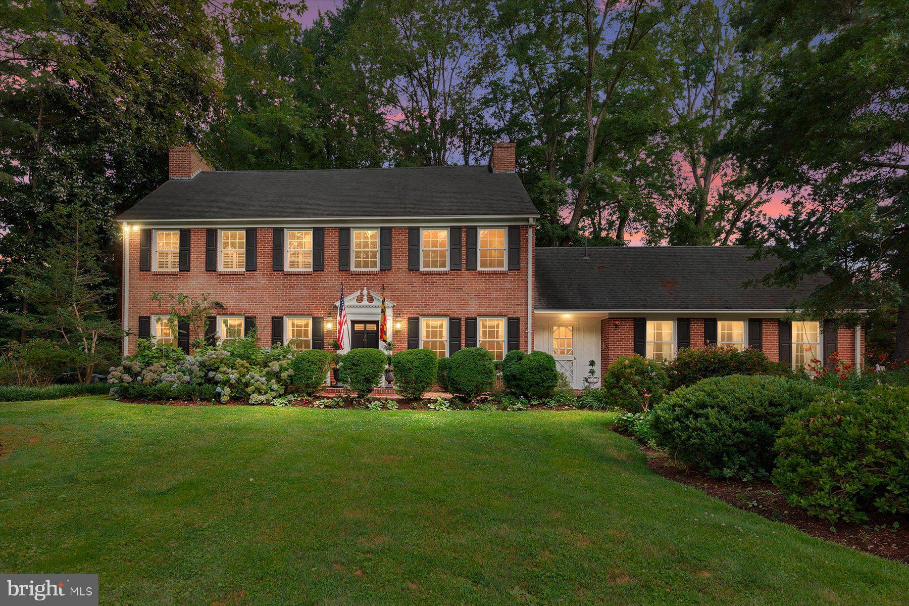 Set on nearly an acre, this timeless colonial in Rugby Hall Estates welcomes you with a gracious presence that feels both classic and inviting. Surrounded by mature trees and beautifully established landscaping, this four-bedroom, two-and-a-half-bath home offers the perfect blend of enduring character, generous living spaces, and a setting that invites you to slow down and savor every season.
The moment you step inside, you're welcomed by a beautiful staircase that anchors the home with classic elegance. The main level flows effortlessly from room to room, offering a formal living room with fireplace, dining room, inviting family room with a second fireplace, and a kitchen overlooking the picturesque backyard. An updated powder room adds modern convenience, while a practical mudroom just off the kitchen provides easy access to both the backyard and the attached two-car garage. Upstairs, each of the four bedrooms is filled with natural light and enhanced by charming built-ins that add warmth, character, and everyday functionality. The lower level offers a spacious great room along with abundant storage, providing flexible space for recreation, hobbies, or future possibilities. Outside is where this home truly shines. The screened porch is made for slow mornings with coffee and peaceful summer evenings, while the gorgeous oversized in-ground pool becomes the centerpiece of gatherings with family and friends. The expansive backyard offers plenty of room to entertain, play, garden, or simply enjoy the privacy and beauty of nearly an acre. An in-ground sprinkler system helps keep the landscape looking its best, allowing more time to enjoy everything this remarkable property has to offer. Life in Rugby Hall Estates extends far beyond your own backyard. The community waterfront offers a breathtaking place to watch the sun set over the Severn River, while neighbors gather to enjoy everything this cherished community has to offer. Residents have access to a community marina with multiple boat slips, a boat ramp, pavilion, and playground making it easy to embrace the waterfront lifestyle that makes Rugby Hall Estates so special. This is a rare opportunity to own a home filled with timeless charm in one of the area’s most treasured waterfront communities in Severna Park School District, where every season brings something to look forward to and every day feels a little more connected to the place you'll love calling home.