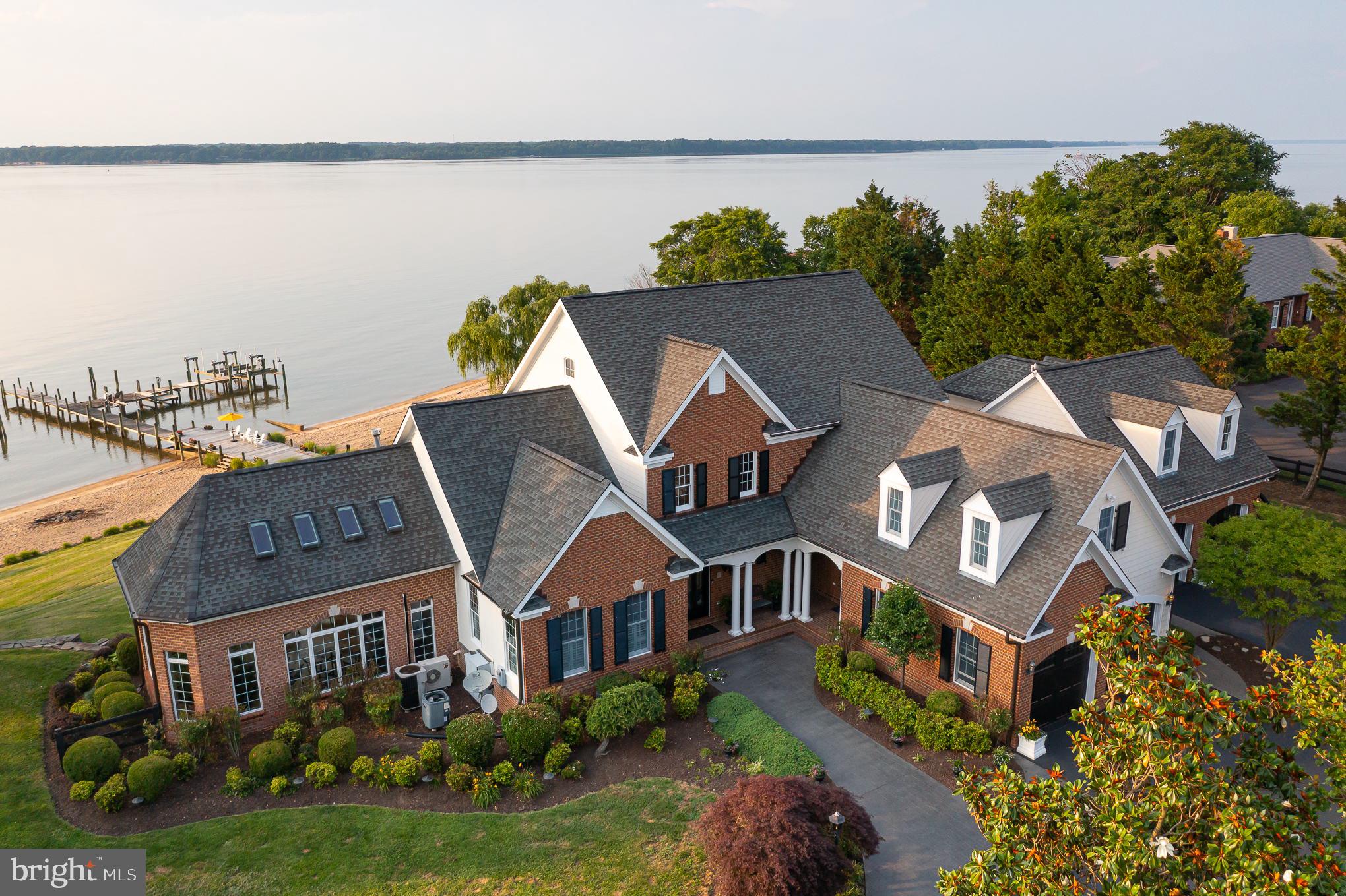 6.4 fenced acres on the Potomac River with w/expansive water views, breathtaking sunsets, and a PRIVATE sandy beach and dock!  Custom built by a local builder for their personal residence. Enjoy amazing views of the Potomac River with 240 linear feet of waterfront, a private dock, two large boat lifts, and one jet ski lift.    Spacious floor plan with four finished levels and a detached apartment.  .  The property includes Parcel number 9A (4 acres with barn).  Custom-built luxury home with many upgraded features, including Anderson windows and doors, gourmet kitchen with custom cabinetry, 
granite countertops, and so much more.  Please see 
DOCUMENTS for a list of features - no sign n property.
Use WAZE app for directions!