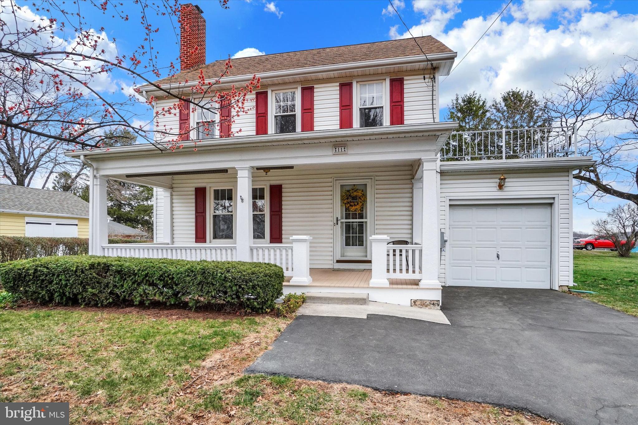 Welcome to your charming, traditional colonial home featuring quality-built craftsmanship at 11 Wilson Court, Red Lion! This timeless property constructed in 1932, offers a newly covered porch entrance leading into the living room with a wood fireplace, dining room and kitchen on the first floor. The garage entry is conveniently on this level. Upstairs, the primary is carpeted, and the other 2 bedrooms have hardwood floors, beaming with natural light and deep closets. The tiled, full bath is conveniently located here too. A unique facet is an access door to a roof above the attached garage for watching fireworks, the stars, or private sunbathing. A staircase leads to an expansive bonus third floor location to personalize your potential grand 4th bedroom, recreation zone, or office! The basement has laundry hook up, two cold storage rooms with shelving, a workbench and a generous storage, fitness, or hobby place - the choice is yours! 
That's not all.... the manicured 1/2-acre level corner lot is private for large gatherings and also offers a tranquil country setting. Wilson Court is perfectly situated close to the booming downtown Red Lion revitalizations, minutes from shopping, schools, playgrounds, parks and even farmland. Don't miss your opportunity to embrace a lifestyle of comfort and convenience in this amazing home. Schedule a showing with me today and make it yours!