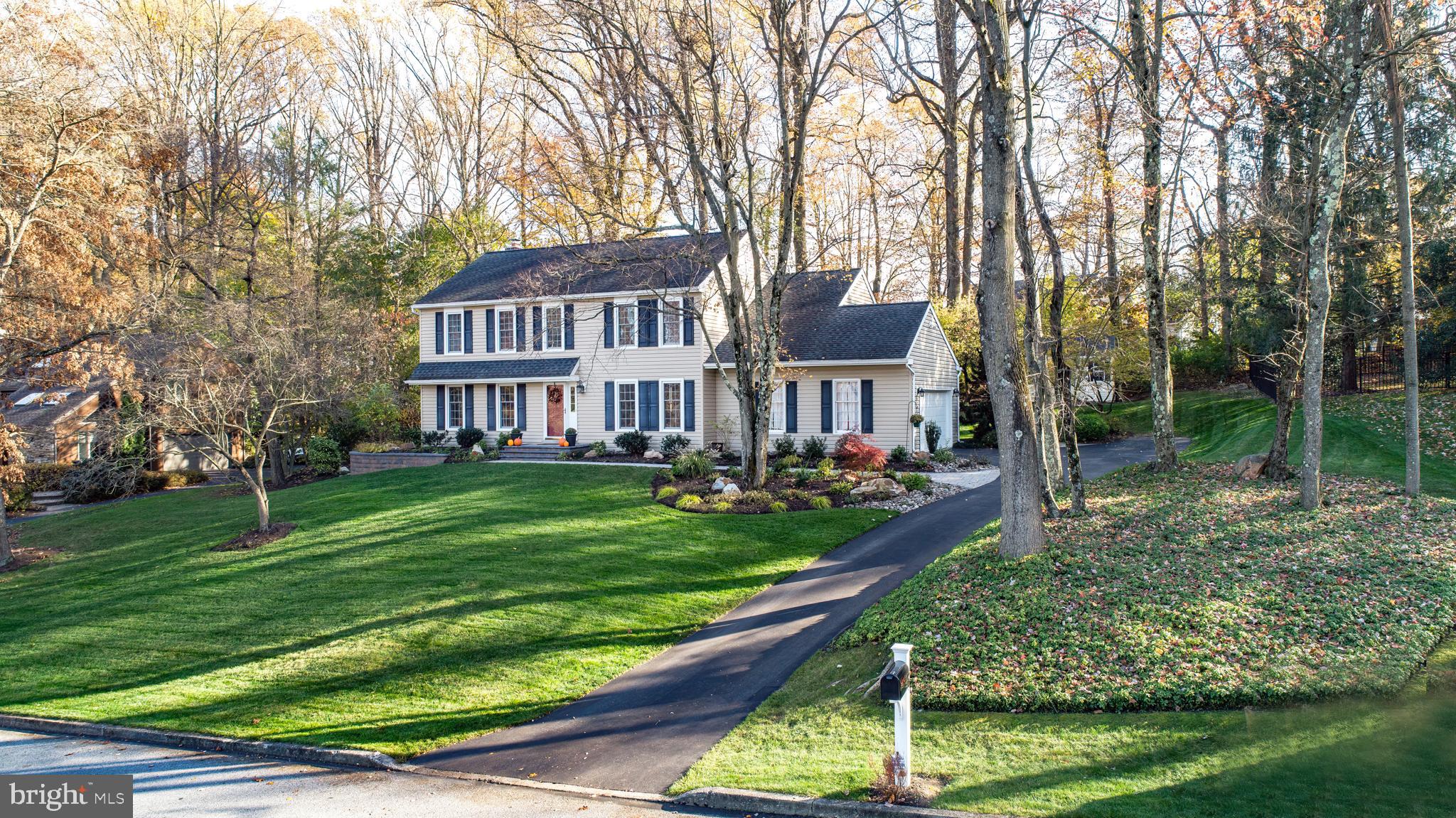 Discover your dream home at 105 Hickory Drive in Downingtown, PA! This captivating 4-bedroom, 2.5-bathroom colonial is a true gem, nestled in a picturesque, wooded setting. Step onto the newly redone walkway, and as you open the front door, let the warm oak floors welcome you. The living room, spacious and inviting, flows seamlessly into the dining area, adorned with elegant chair rail and crown molding. Imagine cooking in the expanded white kitchen, where granite counters, a tiled backsplash, and stainless appliances including Bosch dishwasher, Frigidaire glass top stove, LG microwave all blend with under-counter and pendant lighting to create the perfect culinary space. The family room, your cozy retreat, features recessed lighting, a ceiling fan, and a stunning floor-to-ceiling brick fireplace. It opens onto a beautifully redone paver deck with block walls and a firepit, an idyllic spot for both entertaining and unwinding. Upstairs, the opulent primary suite awaits, complete with crown molding, a ceiling fan, and a luxurious bathroom with a glass shower and jetted tub - your private sanctuary. Three additional bedrooms, each with ceiling fans and lights, share an updated full bathroom, offering comfort and style. Step down to the fully finished basement where a unique wine room with a 200-bottle capacity takes center stage. The large laundry room with a wash basin and second refrigerator adds convenience to this already impressive space. Outside, the expansive deck and fire pit invite you to enjoy evenings under the stars. Additional features like leaf filter gutter guards, a Nema electric outlet for Tesla charging, pull-down stairs from garage to attic, an Aprilaire system, and vinyl replacement windows ensure your home is both comfortable and low maintenance. ***Don't miss our exclusive website for this home, featuring a 3D Matterport tour, Virtual Reality Walkthrough, detailed floor plan, professional photography, aerial drone footage, and a community video. Note: Some photos have been digitally enhanced.*** Come visit 105 Hickory Drive today and see yourself living in this extraordinary home! Close to everything this area has to offer including Marsh Creek Park, Struble Trail, Eagleview Town Center, Amtrak & Septa train station, shopping, and restaurants for your enjoyment.