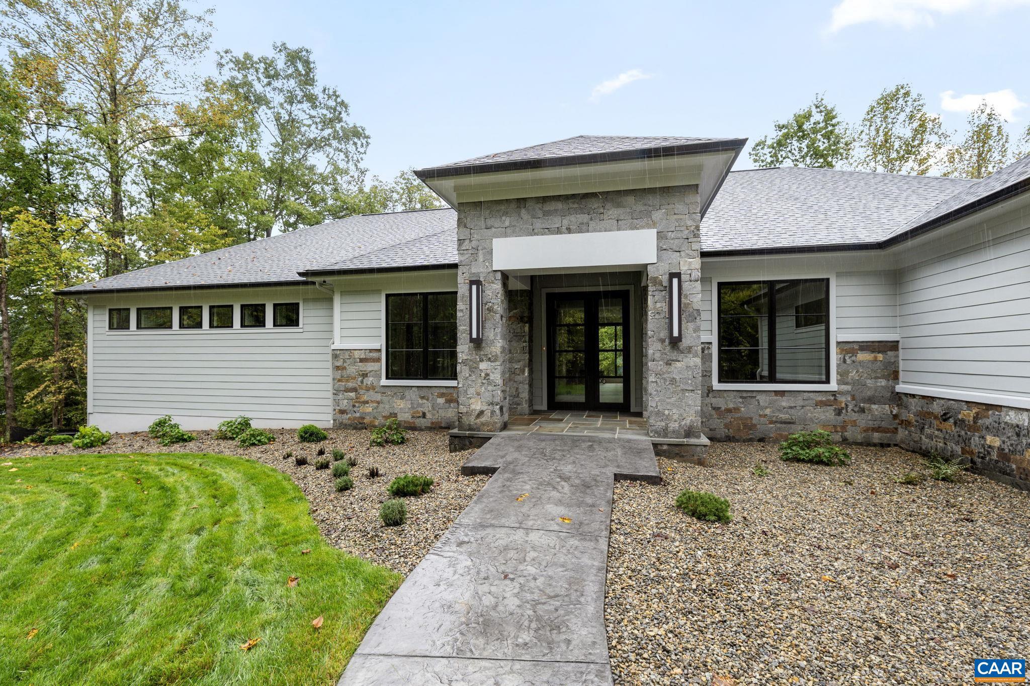 Custom pre-sale. Buyer worked with builder and draftsman to design custom home. This custom home will feature one level living and an impressive six car garage (a two-car garage above grade and a four-car garage below grade). Proffit Ridge is an established, distinctive Albemarle County neighborhood offering a unique combination of stately, classic homes in a neighborhood setting while offering individual privacy as well! 2 - 7 acre parcels, steps from Baker-Butler Elementary & moments from the extensive amenities of Hollymead Town Center. The location offers quick access to the Airport & a reasonable commute to Northern VA. Hospitals & major employers w/in 5-10 mins. Conscientious local builder of premium residences who has completed the existing homes in the neighborhood. His availability to his clients is truly noteworthy, as are his skill set & taste levels.,Granite Counter,Painted Cabinets,Wood Cabinets,Fireplace in Family Room