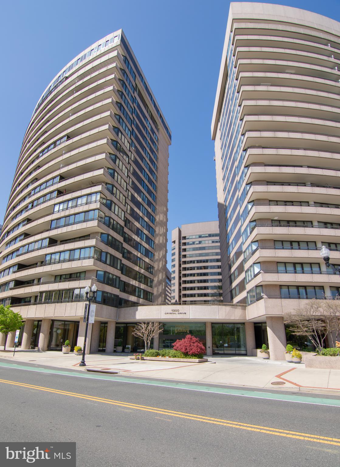 Spacious, bright, open 2BR/2BA in Luxury building in Crystal City.  Move in ready,  new laminate hardwood floors, beverage cooler in wet bar, new vanities in master and hall bath.   Huge, over 1500 sq ft condo  with separate LR with wet bar and access to balcony, DR with built in storage, large kitchen with great storage, full size W& D, nice size 2nd BR with built-ins and access to balcony.  Master retreat with access to balcony, walk-in closet, plus second closet. Spa marble bath with soaking tub/ separate shower. Garage and storage unit included in rent.  All with the amenities of Crystal Gateway: Concierge service, indoor & outdoor pool, tennis, community room, exercise room, sauna, meeting room. All just minutes to DC, Pentagon, National Airport, New Amazon East Coast Headquarters, Crystal City Shops and restaurants, blocks to Crystal Metro blue line and yellow line, In the heart of it all!