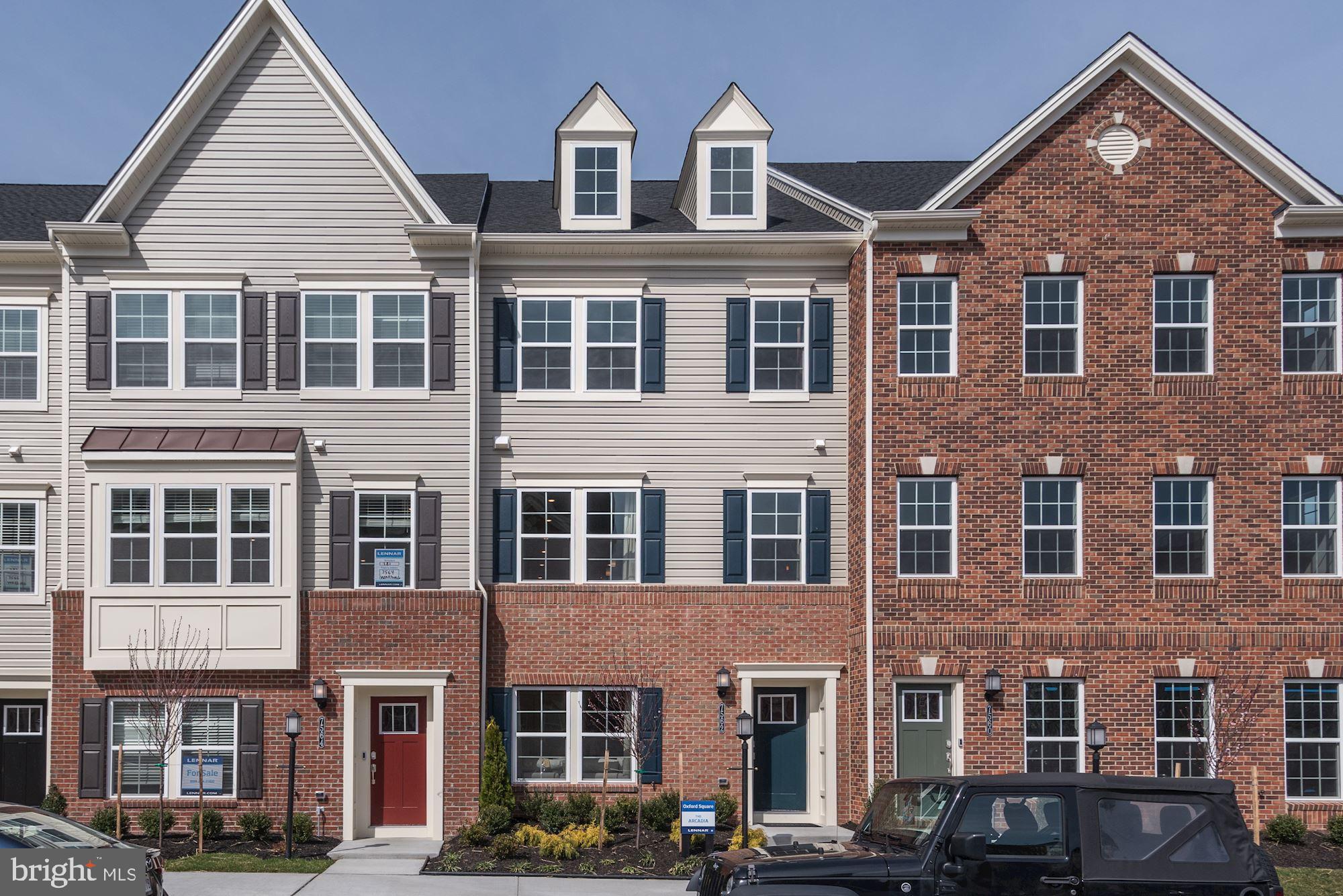 Welcome home to the Yards at Oxford Square, a Leed Certified New Home community in Howard County.  This home is a fully upgraded 2 Car Garage townhome in Elkridge.  The home includes 3 beautifully finished levels up upgraded, energy efficient luxury living.  The first level includes a 2 Car garage and Rec Room.  The main level is highlighted by the 14  granite island, SS appliances, upgraded cabinets and tile backsplash.  The upper level included owners bedroom with walk in closet and luxury bath with granite and ceramic everywhere.  Come see why this community was voted Community of the Year in Maryland.