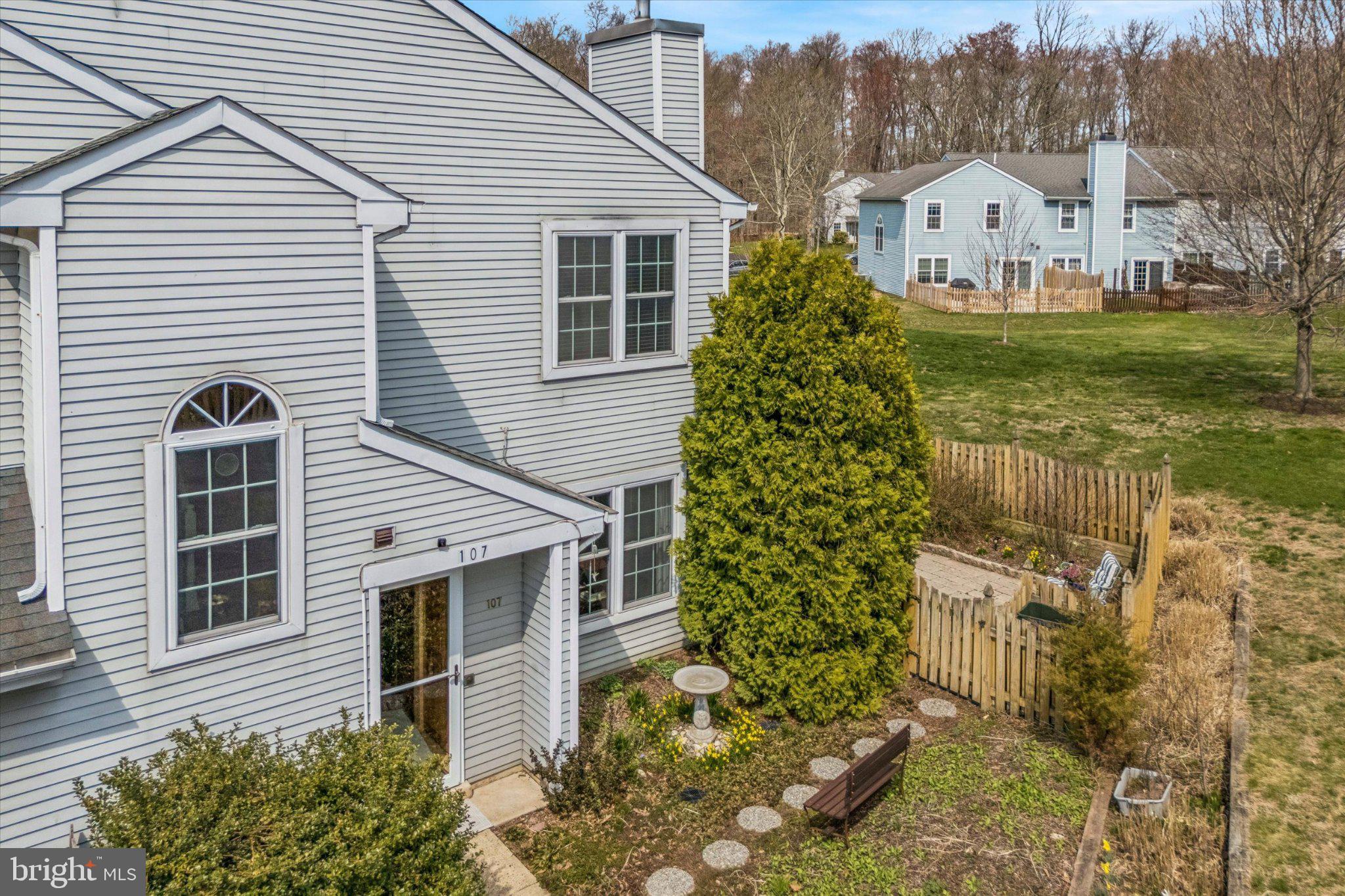 Located in the FOREST PARK subdivision of
New Britain Borough, this end unit, 2 BR, 1.5 Bath 
townhouse is nestled back from the road overlooking a large, open common area. Low quarterly fees of $265.

Convenient Location Highlights: Minutes to New Britain and Chalfont Train Stations; Approximately 1 hour to Philadelphia; 10 minutes to Doylestown for fine dining, shopping, and museums; less than 30 minutes to New Hope and Lambertville for art galleries, antiquing, restaurants and boutique shopping. Located within the award winning Central Bucks School District.

The first floor of this charming home welcomes you with its designer touches: warm, comfortable cork flooring; granite surround, inset wood burning fireplace able to heat the house all winter; expanded kitchen with ample cabinet and counter space for the gourmet. A stylish powder room with granite top vanity sits around the corner at the foot of the stairs. From the dining room, the slider opens onto an expansive patio thoughtfully landscaped to provide interest through the seasons. Plenty of room for entertaining or to simply enjoy the quiet. 

Upstairs, crisp hardwood floors grace the large, light filled bedrooms. The MBR welcomes morning sun (black-out blind included in case you are a night owl), views the common area and features a thoughtfully designed closet layout.
The second BR which can be used as an office, TV and / or guest room, includes a warm maple wood blind in a room which also receives wonderful, afternoon light. The laundry is conveniently located on the second floor. The full bath, in warm tones invites you to luxuriate in the deep, jetted tub. Maple cabinetry is complemented by a granite top vanity surrounding a sink which can only be described as jewelry.

This home is truly well thought out in its design and finishes. Experience the difference of Forest Park living today!