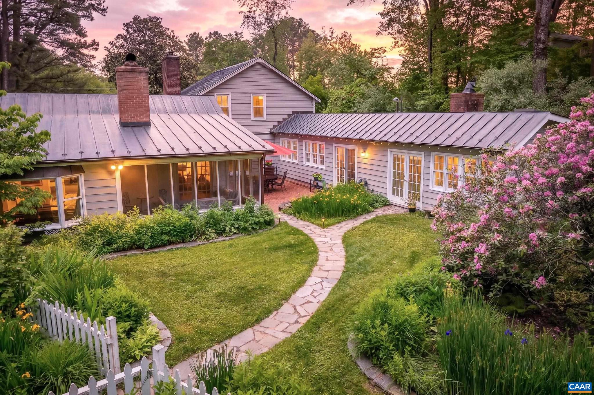 Tucked among lush gardens, rock outcroppings, and tranquil stream, this enchanting property blends timeless charm and luxurious comfort just minutes from popular Crozet. Enjoy effortless indoor-outdoor living with a breezy floorplan that flows from gathering spaces to private owner's suite to serene outdoor retreats. A spacious great room w/ fireplace & cathedral ceiling w/ exposed beams opens to kitchen & dining, both with heated floors. The kitchen exudes warmth w/ soapstone & quartz counters, stunning copper hood & Viking gas range. Step out to the screened porch overlooking gardens, courtyard & koi pond. Find another spot to gather in the charming living room w/ hearth and 2 picture windows! In its own wing, the private Owner?s Suite is a restful retreat including sitting room w/ fireplace, large walk-in-closet and luxury bath w/ soaking tub, handsome cabinetry, separate vanity & heated floors. There?s even a private sunroom and a home office with view! Upper BRs, accessible via two stairways, share a full bath. Detached 2 � car garage/workshop features a private apartment ideal for guests or rental. Enjoy the fun! Heated pool and shady gazebo or cross the bridge to the playground! Whole house generator.,Quartz Counter,Soapstone Counter,Fireplace in Great Room,Fireplace in Living Room,Fireplace in Master Bedroom