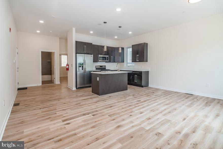 *Available Now!*

Live in the exclusive luxury apartments at the Queen Village Flats. Located just three blocks from South Street, minutes to Target, Home Goods and Ikea on Columbus Blvd and quick access to I-95, this unit is a must-see! This bi-level 3 bedroom, 3 bathroom apartment offers 1650 square feet of luxury living that includes central air, ceiling fans, high ceilings with recessed lighting, washer/dryer and hardwood floors! The kitchen exhibits breathtaking contrast between the lighter floors against the dark cabinetry with sleek stylish hardware, designer lighting, in addition to the stainless steel appliances, including dishwasher, microwave, gas cooking stove/oven, and refrigerator; you can cook and entertain your guests as they enjoy the granite counter top breakfast bar. In addition to the kitchen and open concept living, the first floor also includes the first full bathroom and spacious bedroom with a large closet. The tour continues downstairs to find two more spacious bedrooms, each with enormous closets and enough room to fit any sized furniture. The second bathroom features a stunning, frameless glass shower installation and sleek vanity. Finally, the master bedroom features an en suite bathroom with a frameless glass shower and vanity to match 

*Sorry, no pets
