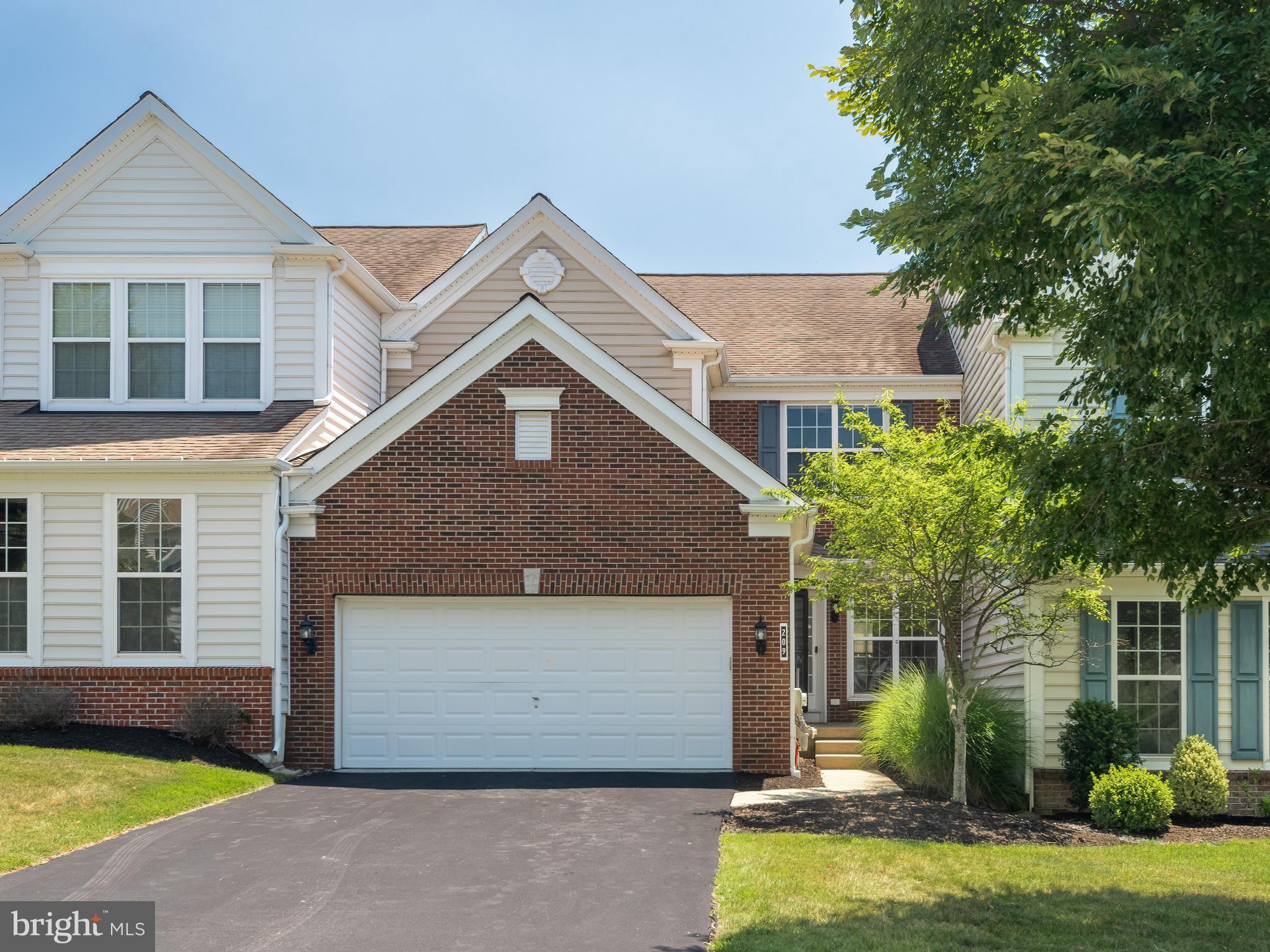 Welcome to 209 N Caldwell Circle, where everyday living feels a little more luxurious. Perfectly positioned within the sought-after Applecross Country Club community, this beautifully maintained home offers one of the neighborhood's most desirable floor plans, combining spacious living with the ease of low-maintenance ownership, all just a short stroll from the clubhouse, pools, and fitness center. Step inside to a bright, welcoming foyer where beautiful hard-surface flooring and fresh neutral paint throughout creates a warm first impression. To your right, the formal living and dining rooms flow seamlessly together, creating an inviting space for everyday living and entertaining. Crown molding, wainscoting, and trimmed columns add character, while an opening between the dining room and kitchen keeps the main living spaces feeling open and connected. Just off the foyer, a private study offers the perfect space for a home office, playroom, or quiet reading room. Continue toward the back of the home where the kitchen and family room come together in one open, inviting space. The kitchen is thoughtfully designed with granite countertops, stainless steel appliances, abundant cabinetry, generous prep space, a pantry, and plenty of room for a dining table. Sliding doors open to the rear composite deck (installed 2024), creating the perfect setup for indoor/outdoor living and effortless entertaining with views of common open space. Back inside, the family room is anchored by a cozy gas fireplace and elegant millwork, making it the natural gathering place for family and friends. A powder room and foyer coat closet complete the main level. Upstairs, retreat to the spacious primary suite featuring a tray ceiling, large rear-facing windows, a walk-in closet, and a private en-suite bathroom with a double vanity, soaking tub, and walk-in shower. Two additional generously sized bedrooms, each with ample closet space, share a full hall bath, while the convenient second-floor laundry room features a utility sink, cabinetry, and a linen closet for added storage and organization. The finished lower level adds even more versatile living space. The expansive recreation room is highlighted by a stunning stone-front bar with room for seating, making it the ideal spot for entertaining, watching the big game, or hosting movie nights. A separate finished room and full bathroom provide flexible space for guests, a playroom, home gym, or hobby room, while the unfinished area offers excellent storage. A two-car garage completes the home. New hot water heater was installed in 2025. Looking to stay active and connected? Living in Applecross means enjoying a vibrant lifestyle filled with exceptional amenities, including scenic walking trails, indoor and outdoor pools, a Caribbean-inspired pool bar, state-of-the-art fitness center, golf, tennis, basketball courts, club dining, social events, and more. Golf enthusiasts will appreciate the exceptional Jack Nicklaus-designed course, with golf membership available. Conveniently located near incredible restaurants, shopping, community parks, major travel routes (30, 322, 100, PA Turnpike), and within the award-winning Downingtown Area School District/STEM Academy, this home offers more than a place to live - it offers a lifestyle. Schedule your showing today!
