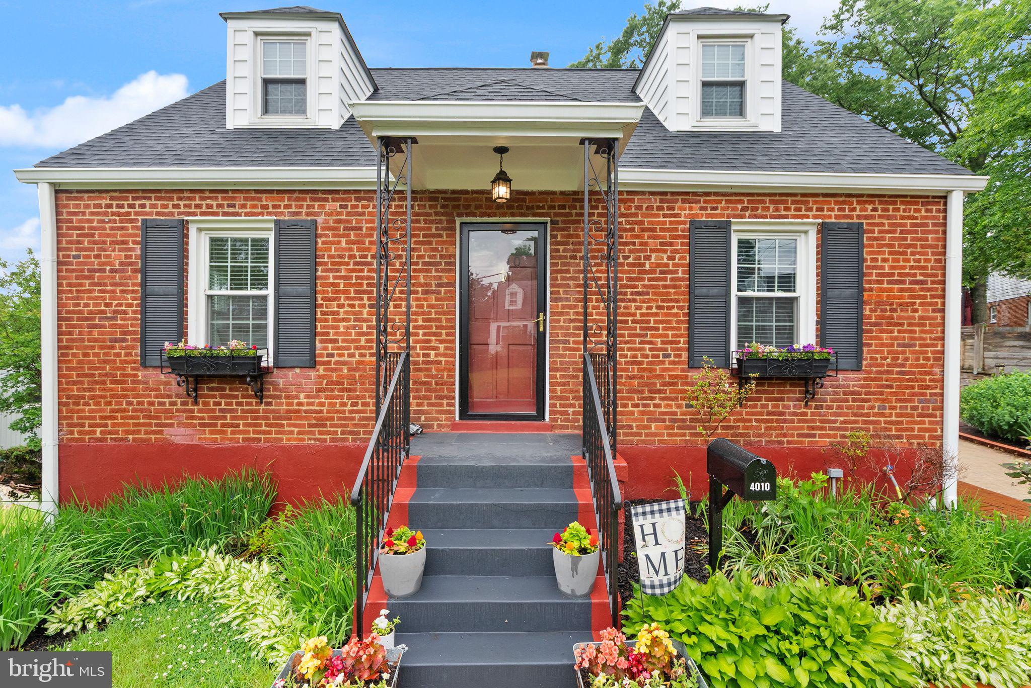 Welcome to 4010 74th Place — a charming Cape Cod in the heart of Hyattsville that blends classic character with a long list of meaningful improvements, including major upgrades. This 4-bedroom home is filled with natural light and a warm, welcoming feel, featuring gleaming hardwood floors and a layout that lives comfortably across three levels.
Inside, you’ll find a beautifully refreshed interior with fresh, neutral paint and newer LVP flooring. The eat-in kitchen features stylish cabinetry, quartz countertops, and modern appliances, creating a bright, functional space for everyday meals and entertaining. The main level includes two generously sized bedrooms, while the upper level is set up as an ideal primary suite with a spacious bedroom plus a bonus area that works perfectly as a home office, sitting area, or reading nook. You’ll also appreciate the finishing touches, including refinished hardwood floors on the upper level and new flooring on the stairs, giving the home a cohesive, updated feel.
The lower level offers a spacious bedroom with a full bathroom and walk-in closet, adding valuable flexibility for guests, extended living, a private retreat, or additional everyday living space. This home has seen major upgrades you’ll appreciate, including a new HVAC (2025), new roof, siding, and side awning (Fall 2025), a shed added in 2025, and a freshly finished walkout basement (2026).
Outside, the expansive fenced backyard is ready for entertaining, gardening, or relaxing, and the extended private driveway with a convenient side entrance makes daily life easy. Additional newer items completed include gutters, chimney liner, a basement waterproofing system with two automatic sump pumps and a vapor barrier (with transferable warranty), and a 50-gallon water heater—offering extra peace of mind.
The location ties it all together: tucked in a peaceful community with quick access to Route 50, 410, 450, 202, and I-495. Plus, you’re within a couple miles of two Metro stations (New Carrollton and Landover) and multiple bus routes. Shopping, dining, parks, and everyday essentials are all nearby, and Woodmore Town Centre is only about five miles away.