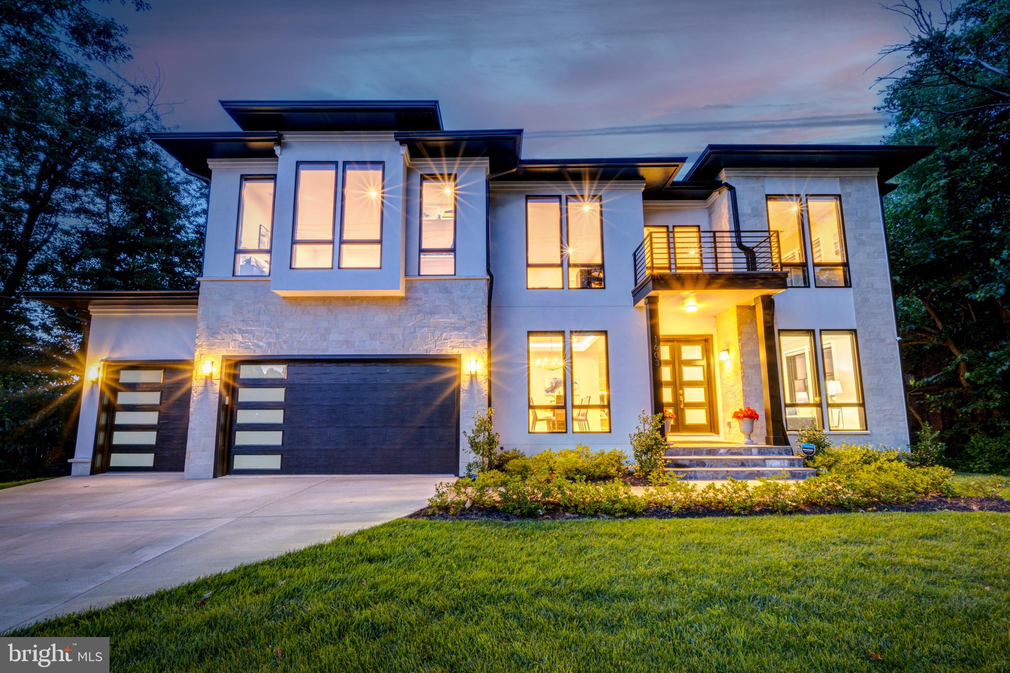 ****OFFERS ARE DUE ON JULY 18TH AT 5PM EST. No offers to be reviewed before deadline.****NEW estate, built in mid-2022, offers a 3-car garage, 7,315 sq. ft, with 7 bedrooms, 6.5 baths, 6 of them are ensuite baths, THEATER room, ABOVE GROUND WALKOUT basement, 7 walk-in closets, with a pool size backyard, this contemporary estate is located in the heart of Mclean, walking distance to many amenities. This home sits in the TOP 1% of public schools in the country! The primary bedroom retreat offers a KING-SIZED WALK-IN-CLOSET WITH AN ISLAND & EXCEPTIONALLY LARGE spa-like bathroom with 4 showerheads and massage jets. The utopian suite features a wet bar, wine fridge, and coffered ceiling. You'll love melting the day's stressors away in the luxurious spa bath featuring heated floors, a sumptuous soaking tub with a hand-held shower, a glass-enclosed rainfall shower with multiple massage shower jets, a built-in long vanity featuring black faucet accents, and stunning windows overlooking the back yard. 
The ultimate eat-in gourmet kitchen is every chef's dream, featuring DACOR appliances: a microwave, 2 ovens, a 6 burner DACOR cooktop with pot filler, a wine refrigerator, a 42" refrigerator, and a state-of-the-art 3-level dishwasher. Custom solid wood, soft close cabinets/drawers, under-cabinet lights, multiple oversized Quartz waterfall counters, and a gracious Quartz center island with a walk-in pantry provide enough space for all your non-perishables. The main level of this spectacular estate also features a formal living room, spacious dining room, and open-concept kitchen/family room that have easy access to each other, creating a seamless flow, ideal for entertaining and everyday living. A spacious work-from-home office with an ensuite bathroom and walk-in closet on the main could easily be used as a FIRST-FLOOR bedroom. An ample mud room conveniently opens to the garage, making loading and unloading groceries, sports equipment, and travel items a breeze. Upon entering the home, you'll be delighted by the soaring two-story foyer and bright, MODERN open-concept floor plan. Custom design elements include 10' ceilings, solid oak hardwood floors, a dramatic wide oak staircase, coffered ceilings, and Pella Lifestyle black floor-to-ceiling windows with designer zebra shades. Doors from your kitchen lead to a private deck - the perfect space for grilling. After meals, you'll love relaxing with your family members or guests in the adjacent family room with its linear gas fireplace, custom built-ins, and floor-to-ceiling windows. The 2nd level reveals a sitting area perfect for gaming or a library. Leading off the sitting area are 4 bedrooms, each with ensuite bathrooms. Each bedroom includes a walk-in closet.
Last but not least, there is a laundry room featuring a Samsung 2 washers in 1, so you could do two loads simultaneously, with the Smart Steam Sanitize function and 2 in 1 Dryer with Steam function, which will make laundry day loads of fun (plus saving you trips to the dry cleaners!) The lavishly appointed lower level is its escape retreat featuring an ABOVE GROUND WALKOUT, a game area, a 4-person island, a wet bar, a wine fridge, an exercise room, two bedrooms, one with a walk-in closet, and a full ensuite bathroom, and a phenomenal HOME THEATER. French doors on this level provide convenient access to the private backyard oasis. Finally, the private backyard features a patio surrounded by mature trees. Professional landscaping offers tremendous curb appeal and showcases the homes' sleek architectural design. The home provides a 10-year builder warranty! This prestigious McLean location offers walking distance to McLean Village, where you'll find restaurants, shops, coffee shops, parks and recreation, and a 5-minute drive to Tyson's malls. 15-minute drive to DC! Easy access to major hwys! Walking distance to many amenities makes this home ideal for an active lifestyle!