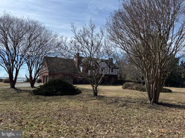 Private 3.31 acre lot with beautiful views across the Potomac River.  Home is almost 6000 square feet with close to 200 feet of rip rapped water frontage.  6 bedrooms and 5.5 baths including a  private in law suite.   Main level formal living room with doors leading to sunroom, formal dining room, private office with custom built ins, large family room  off kitchen with wood burning fireplace and a wine room Upper level bedrooms are very generously sized and all but one have their own private baths attached.  House sits high above the river with views to Virginia.  No flood insurance required.