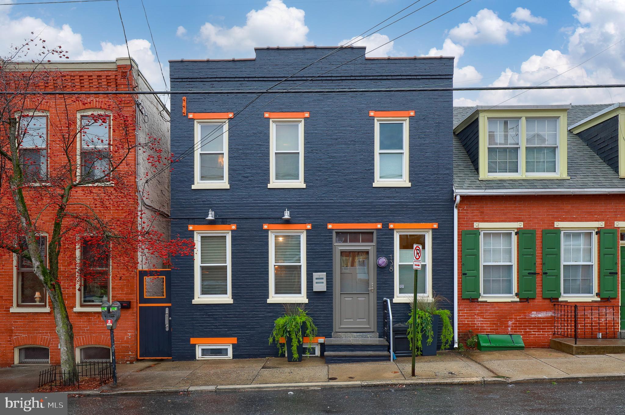 Nestled in the renowned Gallery Row District of downtown Lancaster City, 138 N. Water Street is city living at its best with short walks to Central Market, Zeotropolis, Meisse Candies, The Ware Center, Fulton Theater, and endless shops, restaurants and pubs. Completely renovated in 2010, including a new addition, this home has a modern, urban industrial design perfect for downtown living. An eye-catching front exterior greets you with stunning colors and artisan crafted metal railings and breezeway gate. Inside you will find exposed, original 10’ high wooden beam ceilings, built-in wood and pipe shelving from local craftsman, and a large soapstone island with stool seating, under-counter lighting, and corrugated metal wrap. Bamboo kitchen cabinets, exposed black metal HVAC system, clever hidden TV mount, and sun-tube from the roof brightening the kitchen make this first floor space truly unique. In the new rear addition of the home (2010), sits an additional bedroom/office, powder room, and first floor laundry. 


The 2nd floor contains a bright and sunny master bedroom with on-suite bathroom to enjoy. Highlights include a walk-in closet, soaking tub/jacuzzi, tile shower, and tons of natural light through a double door leading to a large rear roof deck where you can enjoy coffee in the morning and cocktails at night. One additional bedroom and another full bathroom finish out the 2nd floor. Down to the basement, where the current owner has turned this space into an office/lounge area. Parged walls, newly painted walls/ceilings, updated electric for electronics, and plenty of storage space. Peace of mind with fully updated plumbing and electric during the 2010 renovation.  


Exterior rear boasts a low-maintenance gated brick courtyard with mature landscaping and storage, leading to 2 off-street parking spaces. Doesn’t get any better than this. A rare find in the heart of the city. Check out this exciting home today.
