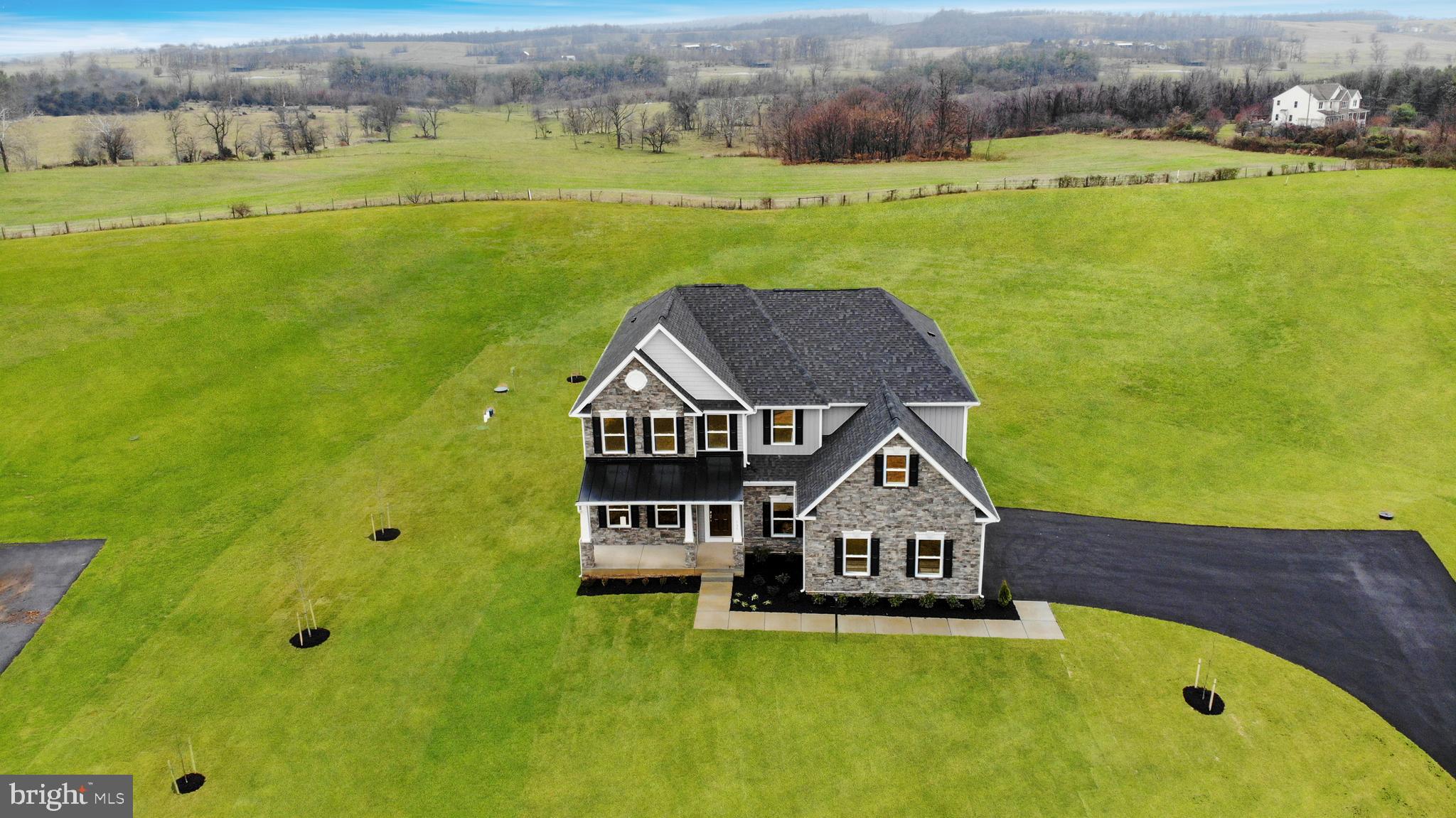 New Construction - Ready to move in.  The Truman is a beautiful home with a full front porch and a 3-car garage, located on a 2.48-acre lot in Hites View Estates in charming Stephens City. 

This home sits in a beautiful cul-de-sac and comes with a stunning sunroom, a first-floor guest bedroom with a full bath, a fully-finished lower level with a full bath, and a walk-up with an areaway that leads to the rear yard. A 10 x 20 composite deck adds to the outdoor living space. 

The interior finishes include a tray ceiling in the owner’s suite, a coffered ceiling in the family room, a stacked stone gas fireplace, a chef's kitchen, and oak stairs with wrought iron pickets.  

Get the keys to this Brand New  Home that comes with all the benefits of New Construction, including a 1-Year Limited Warranty - Workmanship & Materials, a 2-Year Limited Warranty - Internal Systems Protection, and a 10-Year Limited Warranty - Footer, Foundations & More.

Also, get $10k in closing cost assistance with the builder's preferred lender. Don't miss this one!