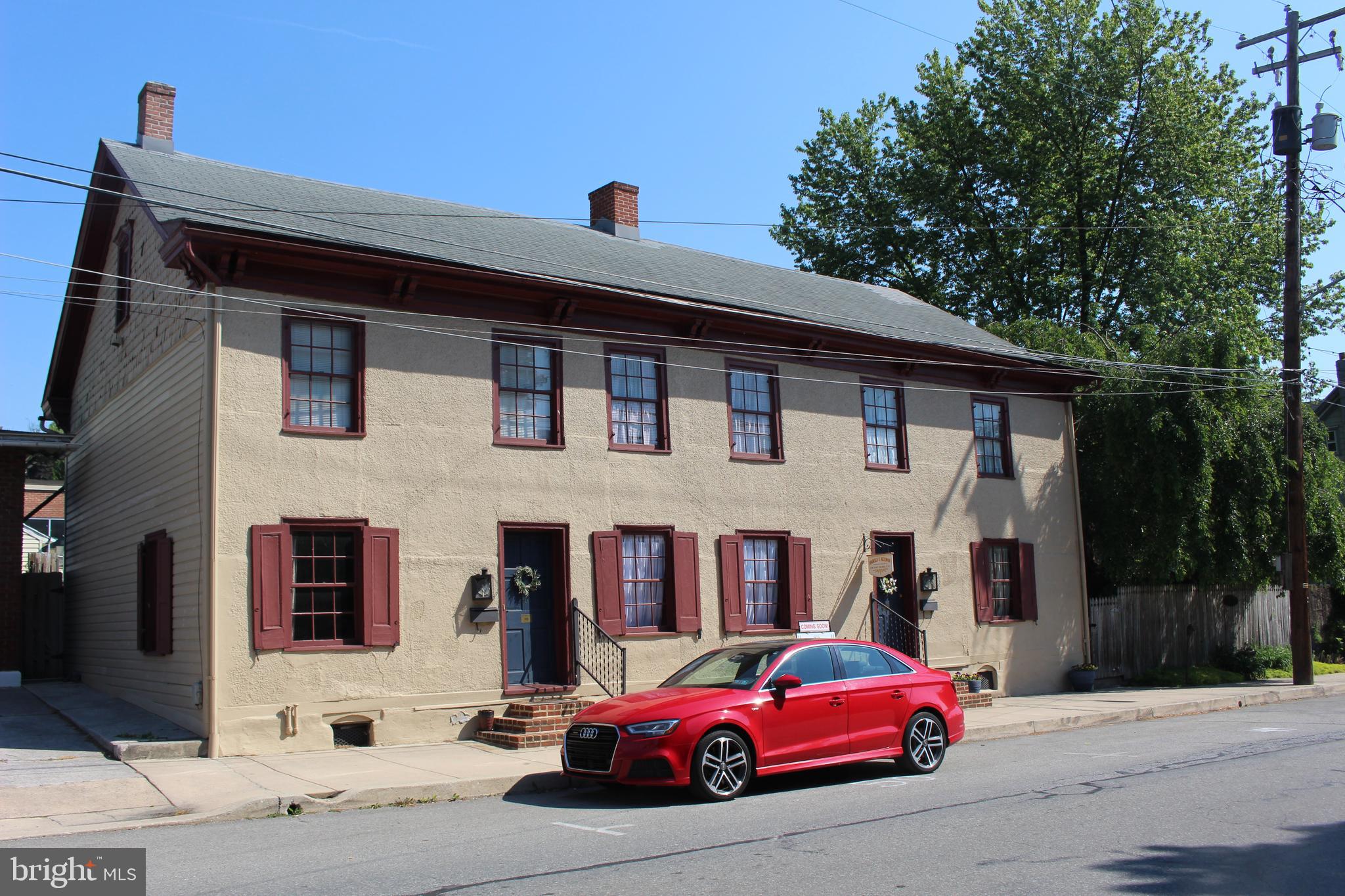 Historic Marietta.  Original log home built around 1810.  Original owner was stone mason who covered log with pebble dash stucco.  Around 1900, home was divided into 2 units.  Both units beautifully restored.  Attached apartment always rented, provides additional income.  Main home 1871 square feet, 3 Bedrooms, 1.5 baths.  Apartment has 1359 square feet, 1 Bedroom, 1.5 baths.