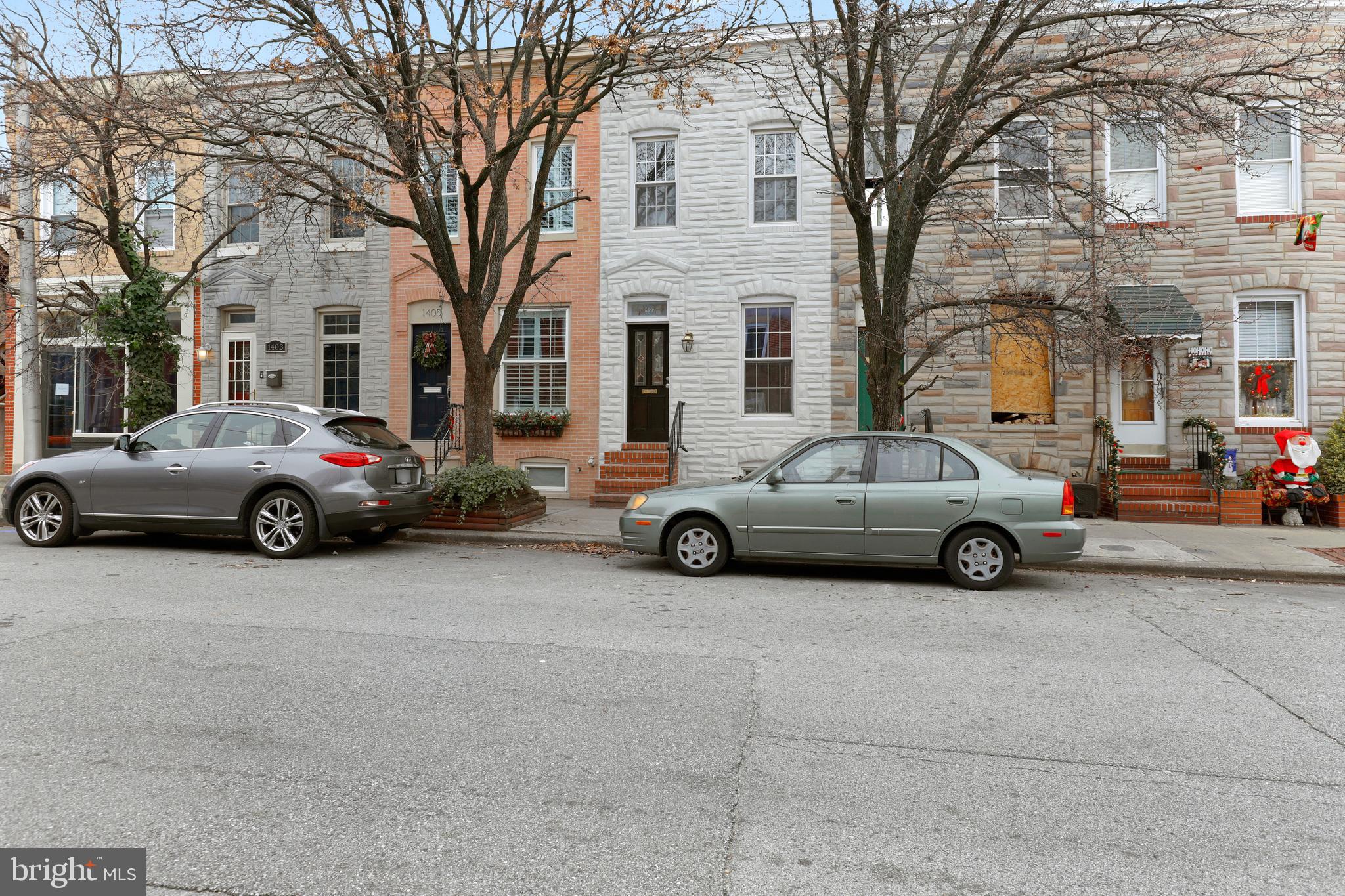 Brand new renovation in A+ Locust Point location.  This home features a beautiful new exterior with painted formstone and window sills.  Gleaming hardwoods throughout the main level which includes a family room, dining room, and upgraded kitchen with stainless steel appliances, quartz countertops, and tons of natural light!  2 large bedrooms upstairs share a brand new hall bathroom with custom subway tile.  There is tons of outdoor living space with a nice sized deck off the rear bedroom and a large patio area off of the kitchen.    This is the nicest home in locust point under 300k!