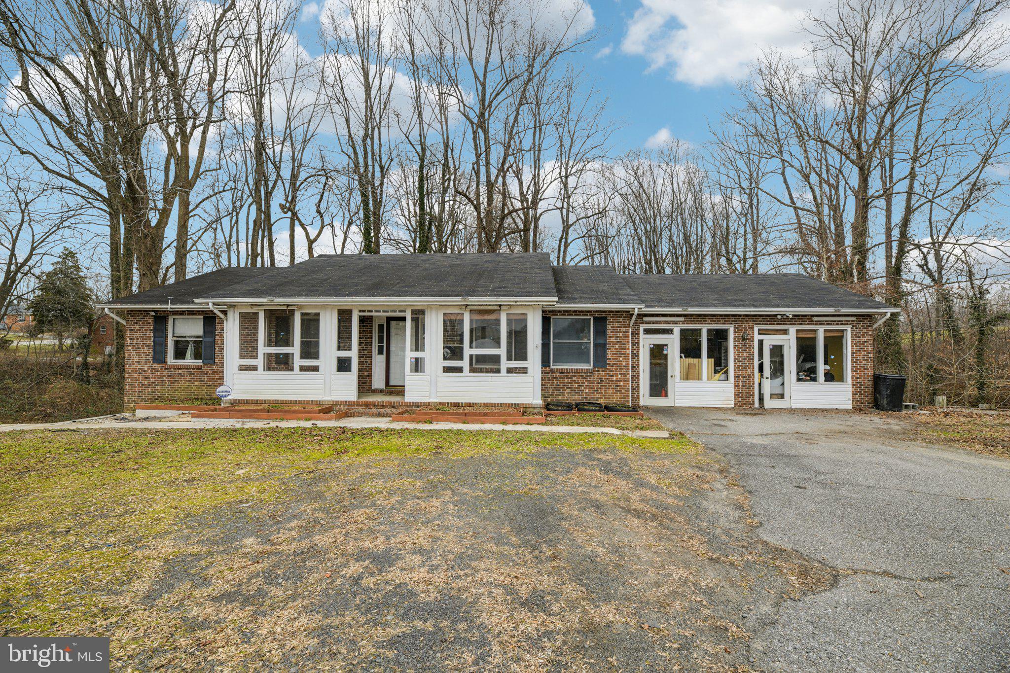 Incredible opportunity in a prime Huntingtown location! This spacious rancher/rambler offers exceptional versatility and potential for a home-based business, investment property, or rental opportunity. Buyer is responsible for all due diligence with local governmental and municipal authorities for any use other than residential, and the seller makes no statements or warranties as to permitted use. This home is being sold strictly AS IS.

The home features 3 bedrooms and 3.5 bathrooms, hardwood floors throughout the main level, and a generously sized owner’s suite with a private en-suite bath. The former 2-car garage has been converted into an office or workplace, offering additional flexible space for business, creative, or remote work needs. The finished walk-out basement is ideal for extended living or income potential and includes a full kitchen with stainless steel appliances, along with ample living and storage space. Situated on a level 3+ acre lot, the property provides privacy, open space, and the possibility for extended parking in the front of the home. This property combines space, flexibility, and location, making it an excellent opportunity for homeowners, investors, or those seeking a property with multiple-use possibilities.