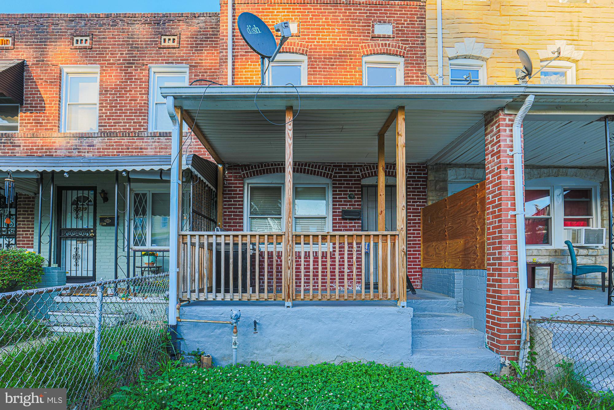More space than you'd expect! This 4-bed, 1-bath brick rowhouse in Baltimore's Brooklyn neighborhood spans four levels — including a bonus attic room and a full basement with laundry. Updated full bath, fresh paint, LVP flooring on the main level, and central A/C already in place. Fenced backyard, covered front porch, and washer/dryer convey. Sold as-is. Great value — schedule your showing today!