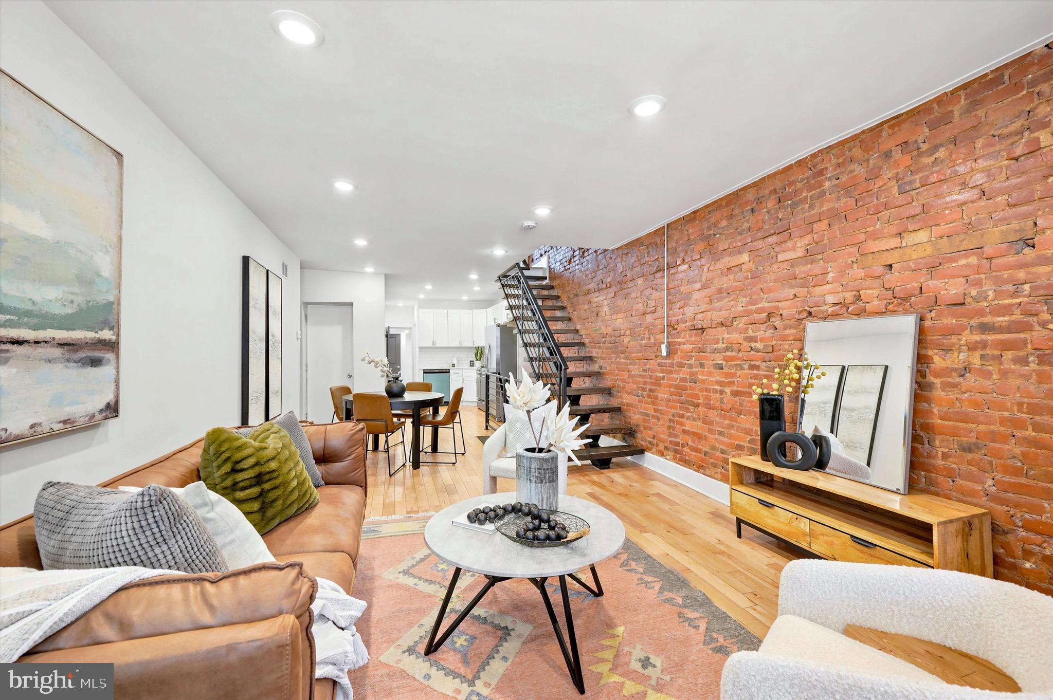 3171  Cedar Street is the home you have been waiting for ! This 3 bedroom 3 bathroom home was fully remodeled 3 years ago and is now ready for its new owner. The open floor layout with EXPOSED BRICK and floating stairs gives the sense of luxury soon as you walk in from your PORCH FRONT HOME! From living room to dining room then right to the kitchen, this space is perfect for entertaining. Go past the kitchen is a first floor full bathroom and bedroom. The backyard is an OASIS and is large enough for any type of gathering. Upstairs features two bathrooms and two bedrooms. The fully finished basement is another perk this home as to offer. Schedule your showing TODAY !