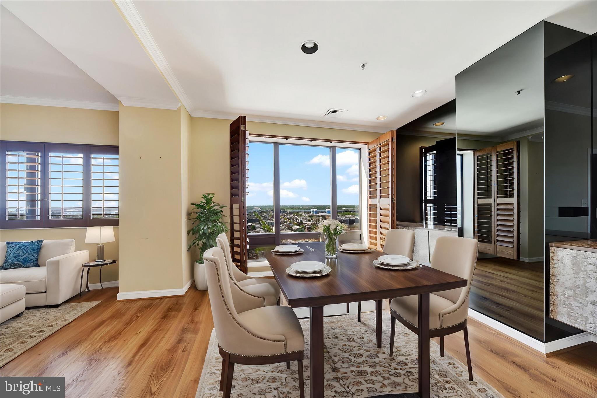 Experience the 19th Floor of the beautiful 10 E Lee Street, The Towers at Harbor Court ! This 1 Bedroom 1.5 Bathroom  has incredible views of Baltimore City from the living room, dining room and primary bedroom. This stunning condo features gorgeous hardwood floors and an desired floor plan, offering a seamless flow for living and entertaining.  The spacious bedroom offers a serene retreat, complete with a large walk-in closet and the primary bathroom features a large walk-in shower. The condo provides a doorman, 24-hr. front-desk service, 1 storage locker, and 1 parking space in the attached, gated garage, party/meeting room, fitness center and pool membership available. Location, Location, Location! Directly across the street from the Inner harbor and waterfront views with easy walks to Federal Hill, M&T Bank Stadium, Camden Yards, convention center, other businesses, shops,  hospitals, and train stations.