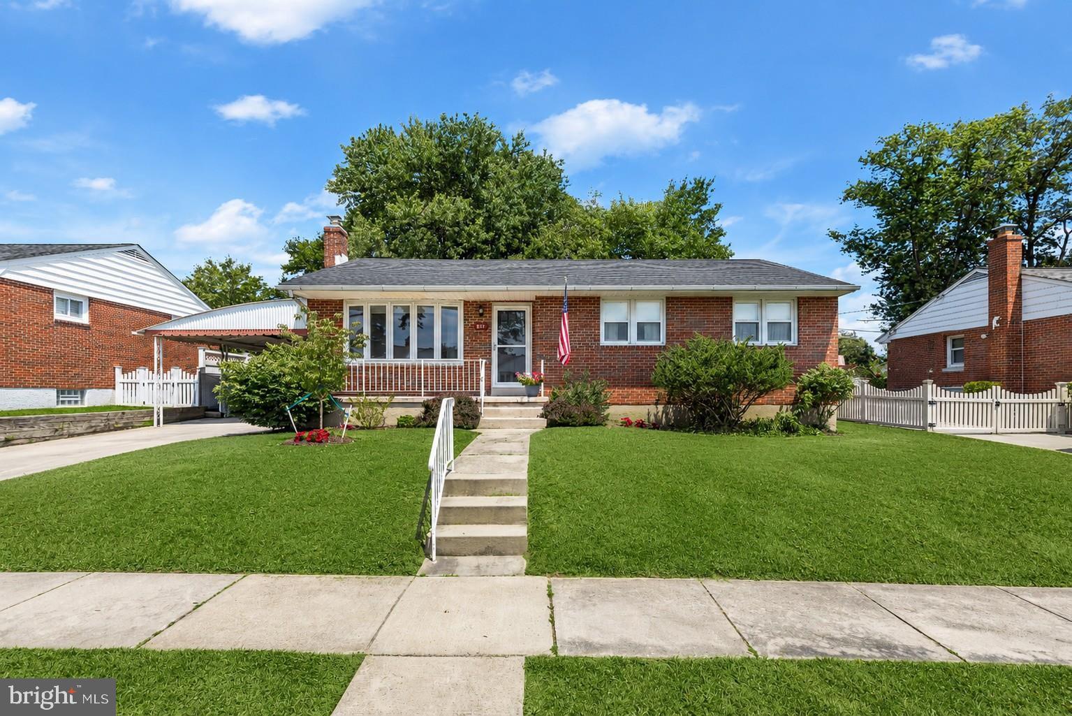 Welcome to this impeccably maintained all-brick rancher, ideally situated in Parkville just outside the Beltway, offering the perfect combination of timeless charm, thoughtful updates, and everyday convenience. Lovingly cared for by its owners, this move-in ready home is ready to welcome its next chapter.

Inside, you'll find three generously sized bedrooms, two full baths, a neutral color palette, and gleaming original hardwood floors that add warmth and character throughout. The inviting kitchen features stainless steel appliances, classic oak cabinetry, and plenty of storage and workspace. The finished lower level provides valuable additional living space, perfect for a recreation room, media room, play area, or home office. An unfinished workshop area with laundry, a full bath, a spacious walk-in cedar closet, and walk-up access to the backyard add exceptional functionality.

Step outside and discover one of this home's standout features—a large, level, fully fenced backyard offering endless possibilities for entertaining, gardening, pets, or simply relaxing. A patio, oversized storage shed, and covered carport complete the outdoor space.

Major improvements provide peace of mind, including a new roof (2025), new HVAC system (2024), water heater (2018), and recently rebuilt rear steps and soffit beneath the rear porch.

Solidly built, meticulously maintained, and filled with pride of ownership, homes like this don't come along often. Whether you're just starting out, downsizing, or simply searching for a home that's been lovingly cared for and thoughtfully updated, this Parkville gem is one you won't want to miss. Schedule your private tour today and see why this could be the perfect place to call home.  Some photos have been virtually staged.