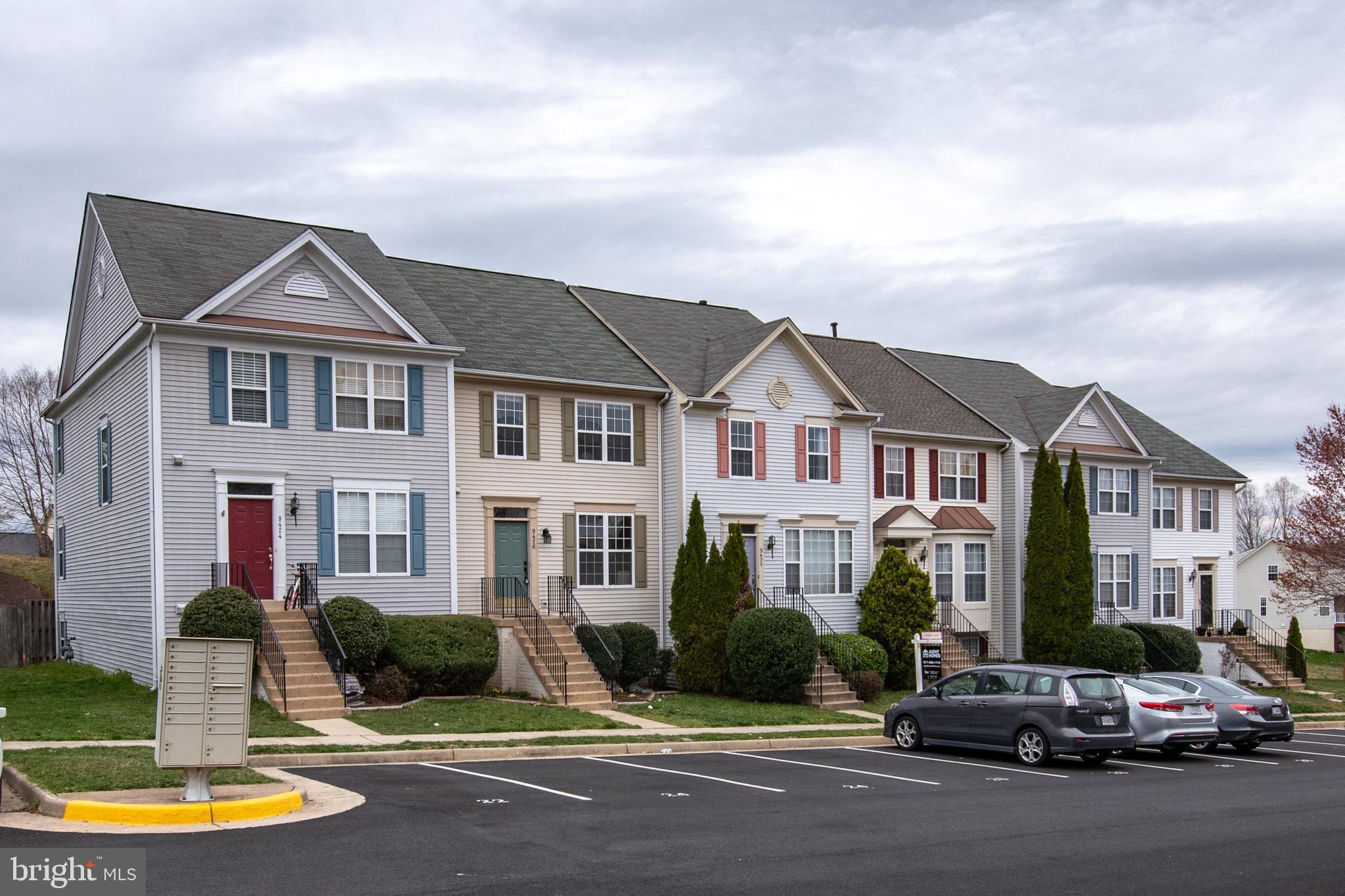 **ALL OFFERS DUE SUNDAY 4/14 by 8pm**Welcome home to this well-kept, spacious yet cozy 4BR town home in beautiful Blooms Crossing! Bump outs on all 3 levels create plenty of comfortable living space. Huge MBR offers over 250 sq. ft. with large walk-in closet, vaulted ceiling, and separate sitting area with huge windows to let in lots of natural light! Spacious master bath with French doors includes dual vanities, and spa tub with separate shower. Separate spaces but with an open and airy feel - enjoy hosting and entertaining on the main floor with both a living and family room, large dining area, recessed lighting, half bath, and excellent closet space!Updated hall bath upstairs along with updated kitchen appliances, washer and dryer, and 2 assigned parking spaces!Large fenced yard with direct access to your finished basement that boasts an additional (4th) bedroom with full bath and excellent storage space!**Home is being sold AS-IS and inspections are welcome, for informational purposes only.**