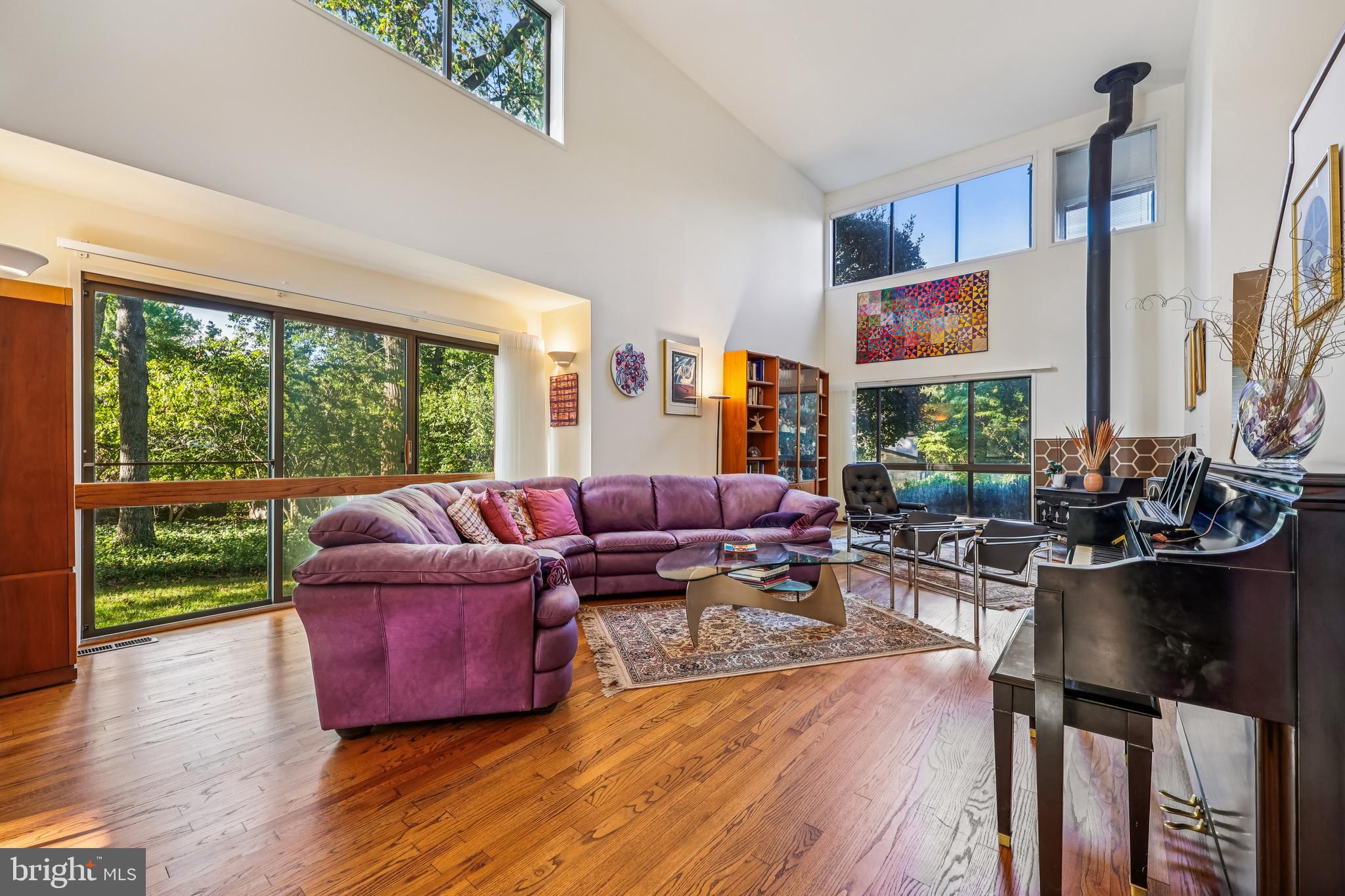 A rare opportunity!
This charming contemporary home, in the desirable Wyngate neighborhood, offers a perfect blend of comfort and style. With 4 spacious bedrooms and 2.5 baths, the open floor plan invites you to enjoy gatherings in the family room, complete with a cozy woodburning fireplace and abundant natural light. The kitchen features an eat-in area and flows seamlessly into the dining space, ideal for entertaining. Step outside to discover extensive hardscaping on a generous 0.33-acre lot, perfect for outdoor relaxation and total privacy - adjoining The Wyngate Woods.. 
The attached two car garage and driveway provide ample parking for you and your guests. Located just a short distance from public transportation options, this home is conveniently situated near local amenities, parks, and shopping, making it easy to enjoy everything the area has to offer. With hardwood floors throughout and thoughtful interior features like recessed lighting and walk-in closets, this residence is a true retreat. Experience the warmth and comfort of this inviting home today!
