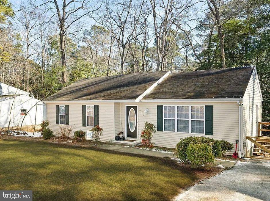 This home is back on the market due to no fault of the seller. They are highly motivated!

Nestled on a serene wooded lot, this stunning three-bedroom, two-bathroom home offers an exceptional blend of privacy and natural beauty. Perfectly positioned away from the road, the property provides a peaceful retreat while still offering convenient access to nearby amenities.

Inside, you’ll find a spacious living area with vaulted ceilings that create an open and airy ambiance, ideal for both relaxing and entertaining. The primary suite is a haven of comfort, complete with its own full bath for added privacy.

Step outside onto the expansive deck, where you can immerse yourself in the tranquil surroundings of lush greenery. Whether you’re sipping your morning coffee, hosting a barbecue, or simply enjoying the sights and sounds of nature, this outdoor space is a true sanctuary.

The property also includes practical features such as a storage shed, perfect for your tools or outdoor equipment, and a large driveway that offers plenty of parking space for you and your guests.

This charming home is more than just a residence—it’s an invitation to a lifestyle of peace and connection with nature. Don’t miss the opportunity to make this your new home!

Property Sold As-is.