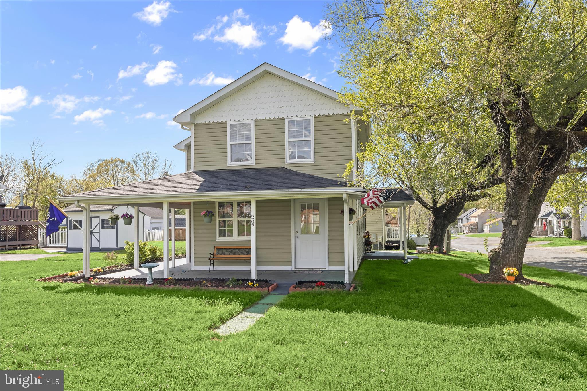 The home is back active, due to the home inspection. Please call the listing agent with any questions.
This North East 3-bedroom, 1.5-bath home offers charm from the moment you arrive. A wraparound porch overlooking the landscaped lawn welcomes you into the main living level, where a sunny living room with soft carpet creates a comfortable place to gather. The dining area features new hardwood flooring and its own separate entrance for added convenience.
The eat-in kitchen is functional and practical, complete with stainless steel appliances and a second entrance that makes everyday tasks like bringing in groceries simple.
Upstairs, the primary bedroom features a vaulted ceiling and ceiling fan for added comfort. The second bedroom is filled with natural light and includes a cathedral ceiling, while the third bedroom also offers a vaulted ceiling and ceiling fan. A full bath and a conveniently located laundry room complete the upper level.
The unfinished basement provides flexible space for storage or future plans to suit your needs. Recent exterior improvements include a new architectural shingle roof with transferable warranties, a LeafFilter gutter protection system, and a fully redone driveway with fresh grading and blacktop. The home also features a newly installed central air conditioning system, adding comfort and efficiency.  Additional Updates Include: lighting with new ceiling fans, refreshed kitchen and bathroom spaces with new paint, fixtures, and finishes, along with newly installed toilets and vanity. The HVAC system has been recently serviced, and new smoke detectors have been added for additional peace of mind. With easy access to I-95 and travel both north and south, this Folk Victorian-inspired home blends everyday comfort with classic farmhouse appeal.
Note:  Select interior photos have been virtually staged.