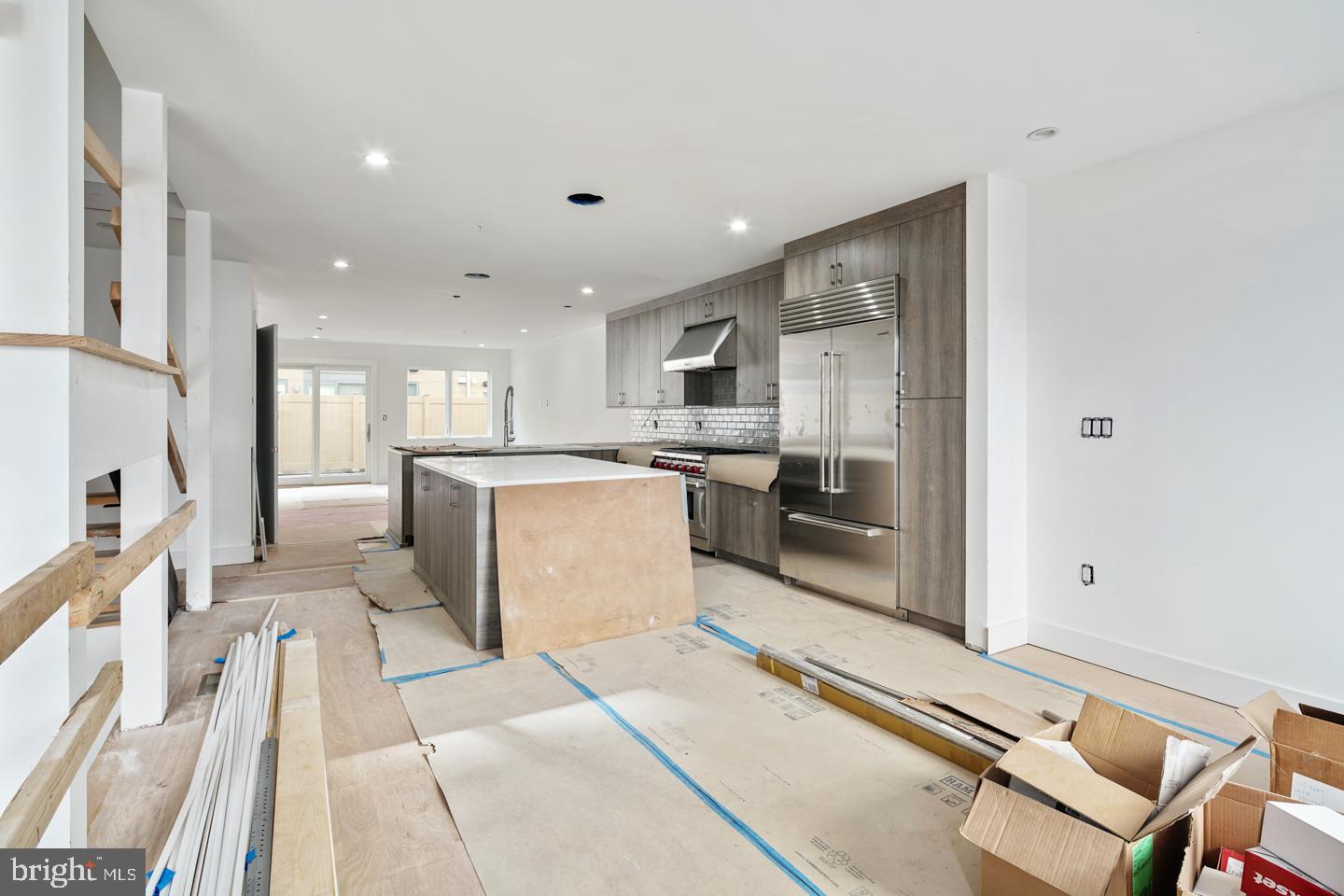 24 Foot wide new construction home with 2-Car Parking, Roof Deck, Elevator, Pending Tax abatement and amazing floor plan all within the Greenfield School Catchment in the Logan Square area of Center city Philadelphia. This home is 100% complete! Top of the line design and construction by the city's premier architect and developer. The designer kitchen has top of the line sub-zero and Wolf alliances, amazing stone counter tops and a huge deck for entertaining. In addition to the huge roofdeck there is also a very large deck off of the living room perfect for entertaining.Tall ceiling heights, smart home system, phenomenal views and more. Enter your new home through the 2 Car Garage with Private Driveway. 4 Bedrooms plus media room, additional office and additional play room.. 4 full Baths and 2 half baths. Finished Basement . Energy Efficient Dual HVAC Systems. Security Alarm with 2 Keypads. Video Intercom System & Home automation system. 8' Solid Core Interior Doors. Metal Handrails/Railings on Stairs. Wood Stairs with stained risers and treads.Tax Abatement Pending. Take advantage of this once in a lifetime opportunity while it still lasts. These homes are selling quickly... Come visit our showroom to view selections! . walk to the Comcast center, Rittenhouse, Fairmount Park, Riverwalk and more. Still time to customize and pick finishes. The home is framed, walk the floor plan! Check OPA for 2019 taxes due to possible citywide reassessment. private trash fee $22.50/mo  .pictures are of another unit in the same development