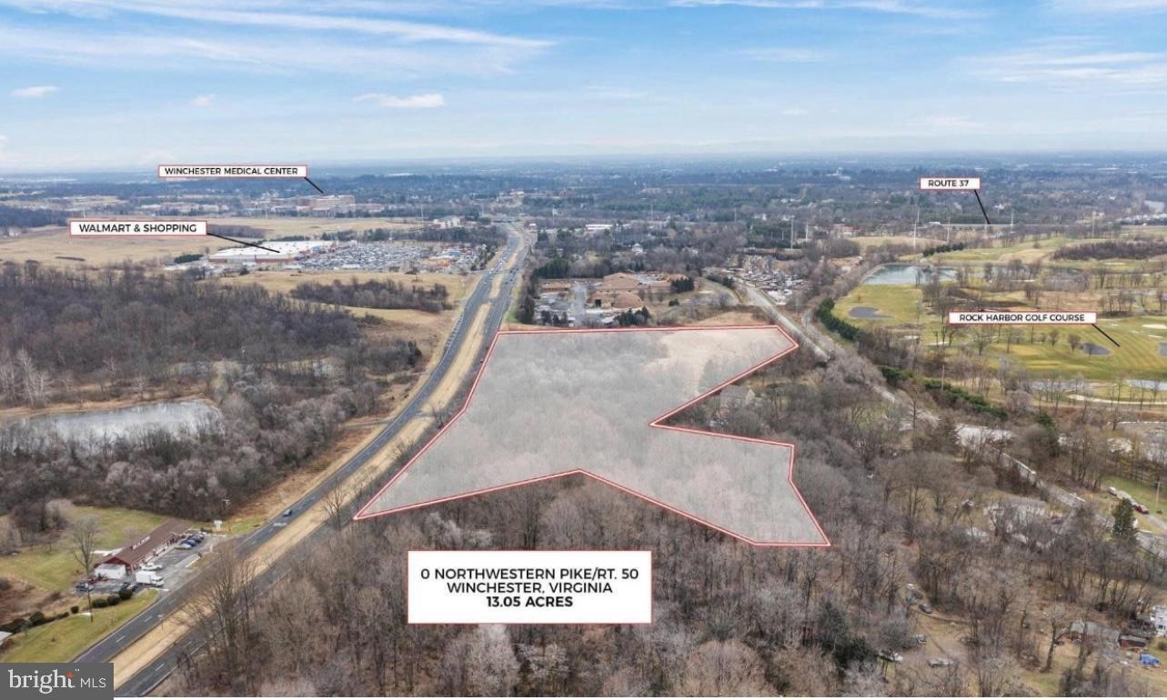 Prime opportunity on 13.05 acres in an unbeatable high-visibility location along Route 50 in Winchester, VA. Positioned directly across from major retailers and conveniences—including Walmart, Sheetz, Tractor Supply, Applebee’s, Dunkin’, Bojangles, and the Winchester Medical Center campus—this property offers exceptional exposure and accessibility. Zoned for multiple development possibilities, with previous concept plans by Greenway Engineering that included options such as a retail strip center with a drive-through end cap and medical office buildings. The area’s strong demand for affordable housing also presents an excellent residential development opportunity. With thousands of daily commuters traveling from West Virginia into Virginia along this corridor, the site benefits from consistent, high-volume traffic flow. This is a rare chance to bring a high-impact commercial or mixed-use project to one of Winchester’s most dynamic and growing areas. Photos may be virtually staged