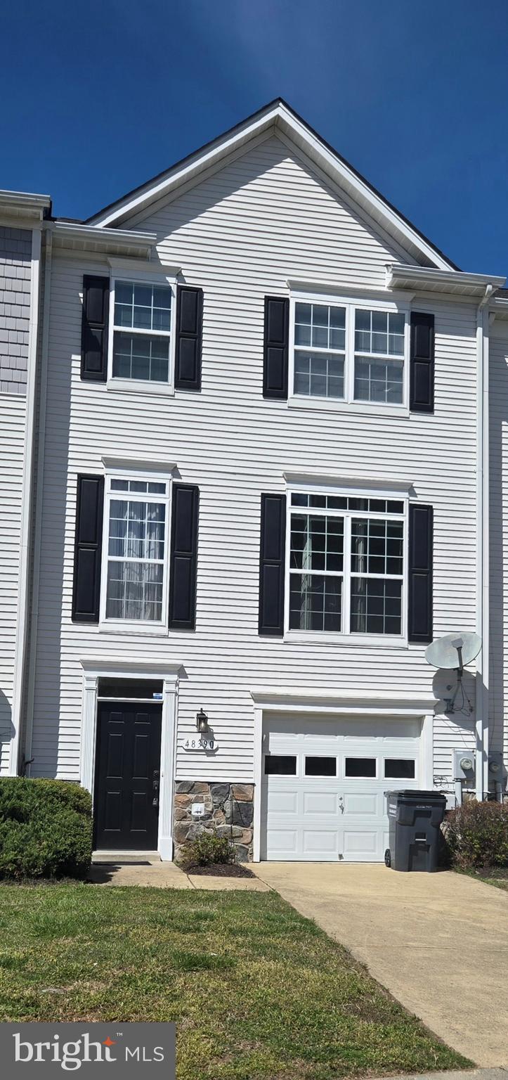 Waterview! Three fully finished floors in a totally move-in ready townhouse set up with an open concept with a Chesapeake Bay view. Very clean with brand new carpet and freshly painted. Hardwood floors on the main level and a bathroom on every level for added conveniency. Nice deck off the kitchen and dining room to enjoy the Chesapeake Bay water views. Or walk down to the community private beach for the morning sunrise. There is a lot of extra room in this home for entertaining or just relaxed coastal living.  New roof recently added with transferable warranty!