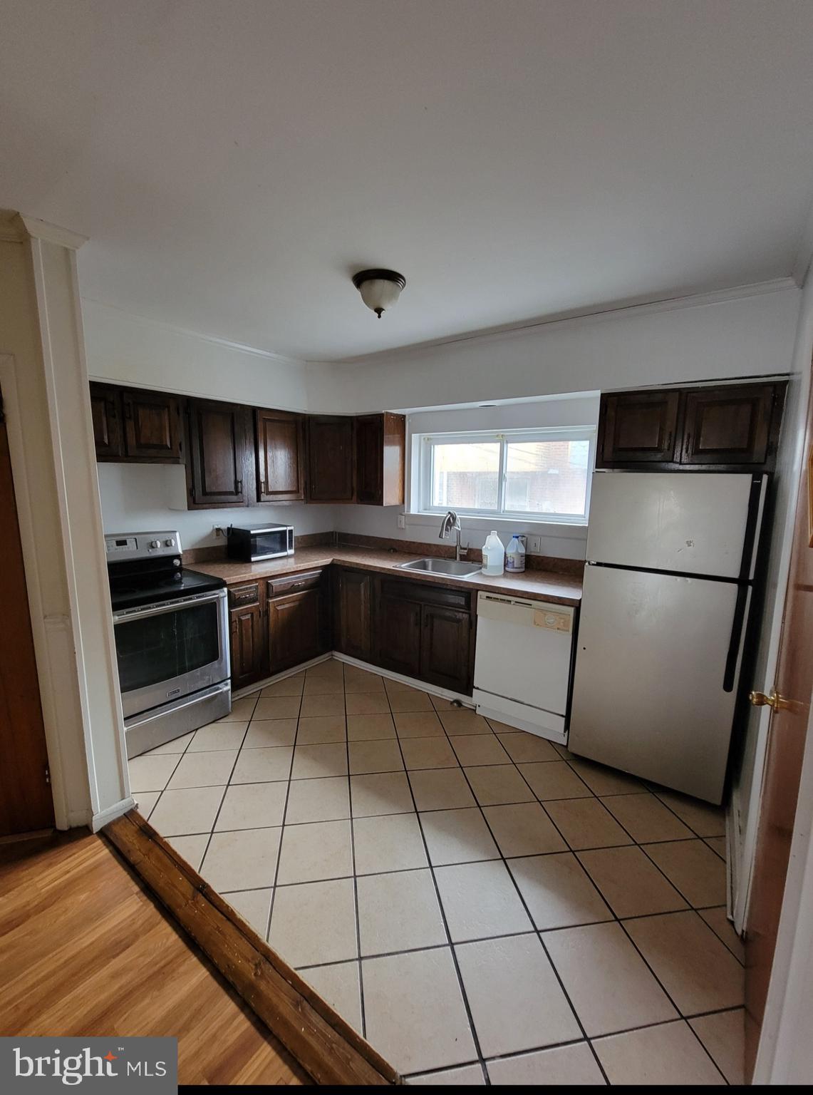 Looking to increase your rental portfolio?  Well, search no further. Welcome to this recently rented row home. Upon walking up to the property you'll appreciate the curb appeal. Walk in pass the front door and you'll enjoy the closed-in front porch for those late summer nights. A few steps away is the living room, dining room and kitchen which resembles an open concept. Ascend to the second floor where three bedrooms and a hallway bathroom are located. Descend down to the semi-finished basement, with a utility room and laundry hookups are located in the rear. The basement also has an egress. The sellers are offering a $1500 credit to their lucky buyer toward the replacement of the 2nd floor carpet and paint. Roof is newly coated and sealed. French Drain is 2 years old. Heater and hot water heater were recently installed as well. Schedule your showing today!