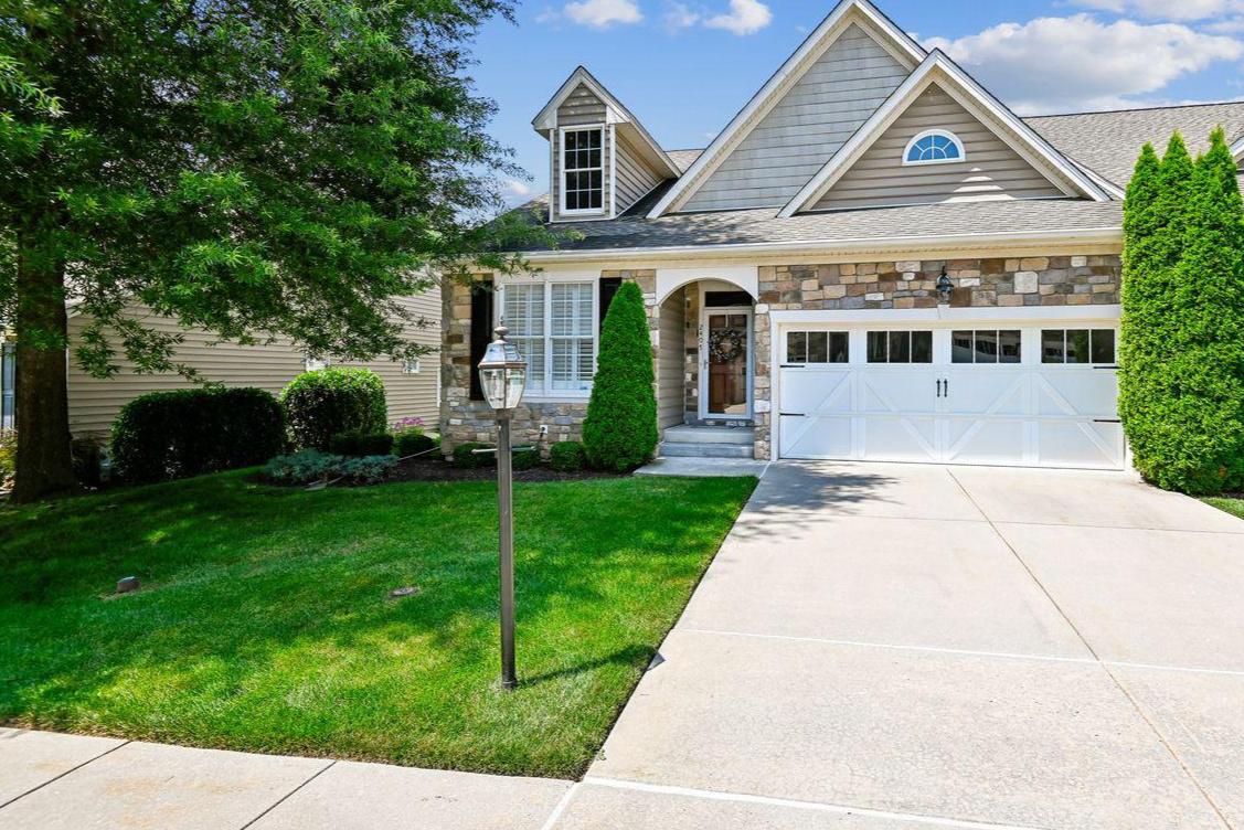 Welcome to the Grand Oaks Condominium Association developed by Clark Turner Homes with unparalleled craftsmanship for active adults age 55 or over. Observe the lovely gardens on St. Mary's Church Road leading to the entrance to the community on your way to 2407 Grand Oaks Court. As you approach the stone front unit the exterior amenities include: sidewalks, light sensitive lamp post, an electric lighted garage door with openers, an outside water spigot, a lighted porch with an electric outlet,door bell, storm door, and a six panel door with a transom window and peep hole for protection. Enter the18 feet long domed ceiling foyer with wainscoting, chair railing, and crown molding above the engineered flooring. The hallway features a coat closet and shelved linen closet next to the main floor second bath. The bathroom features crown molding, a walk-in shower with two seats, a medicine cabinet, exhaust fan, recessed lighting, a solid surface single sink, toilet,and tile floor. Adjacent to the bathroom is the second bedroom with crown molding, a double door closet, window shades, lighted ceiling fan, smoke detector, and carpeted. Beyond the hallway is the dining room with  a domed ceiling, crown molding, wainscoting awaiting your casual or elegant dining. The engineered wood flooring extend into the living room,which features a coffered ceiling, ceiling fan, crown molding,smoke detector, and window treatments, and recessed lighting. The living room is adjacent to the kitchen with crown molding, a tray ceiling, window treatments and transom windows with sliding glass doors leading to the patio using a hand rail from the bump out. The bump out can also accommodate a table and chairs. The kitchen offers crown molding, recessed lighting, a breakfast counter,a stainless steel sink with garbage disposal, appliances are all stainless steel Frigidaire/Gallery, electric cooking, loads of Cabinet space, double door pantry, granite countertop and backsplash, engineered wood flooring leads to the laundry and garage. Laundry has a utility sink, washer and dryer, shelving and another pantry with vinyl flooring leading to the two car garage with overhead lighting.The primary bedroom and en-suite bathroom are entered from the living room. The primary bedroom has a bump out for a relaxing chair to enjoy the sunshine and just chill out or open the glass slider door and use the hand rail to exit to the private patio.
the rest of the room highlights a tray ceiling, smoke detector, lighted fan,crown molding,window treatments and carpeted floors.There are two carpeted closets with lots of shelves, one walk-in with access to the attic and the other for all those extra 
clothes. The bathroom features a dual sink vanity with lots of cabinet space, medicine cabinet, crown molding, tile floor, linen closet,soaking tub and separate walk-in  shower stall with safety bar,recessed lighting, exhaust fan and toilet, tile floor.Need more room? Follow the carpeted stairs to the huge unfinished basement. Just imagine the possibilities! With the two bump outs, there is plenty of room for storage and/or additional rooms. Don't miss out on the opportunity to make this your next home!
