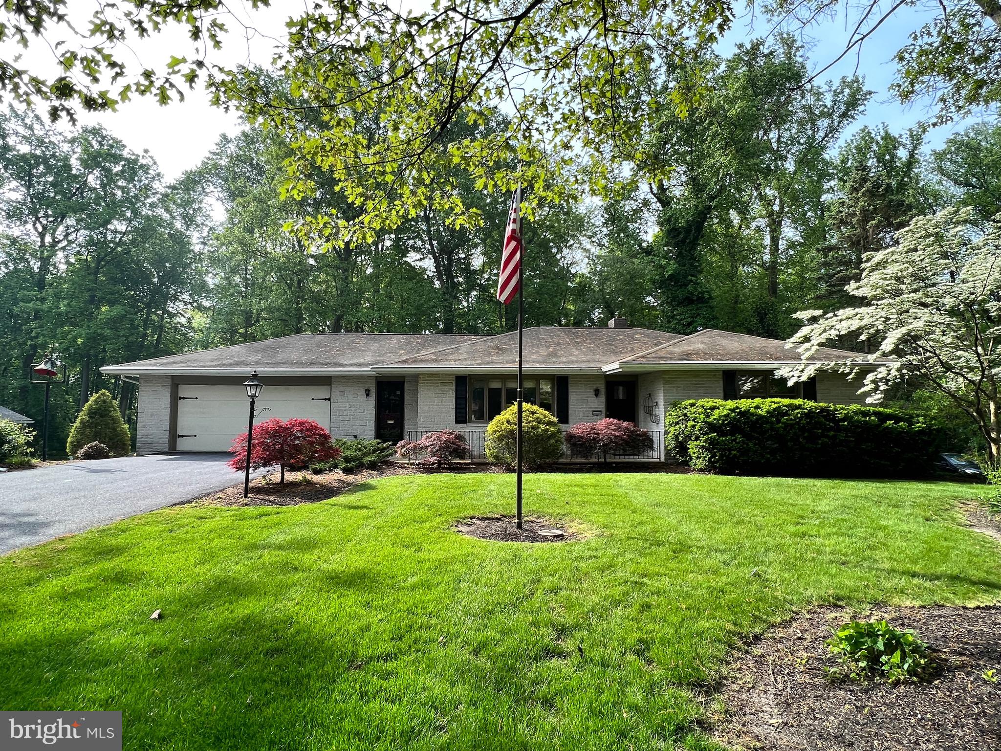 An offer had been received.  Deadline for offer submission is 2 pm today, May 15, 2023.  Close to town but a quaint country feel.   This is an "AS IS" listing that offers 2 bedrooms, 2 baths, ranch style home that has great bones.  Bring your ideas to make this truly a home for today’s active lifestyles.  Bedrooms are nice sized and the bath between is convenient for all.  Fenced in area in the backyard, walk out basement, room for a workshop, 2 car garage, well water, kitchen and dining area, large living room, lower level family room has a fireplace, heat pump with central air,  main floor laundry in the garage or use the hookups for a basement laundry with a handy laundry chute,  tree views to the rear of the home.