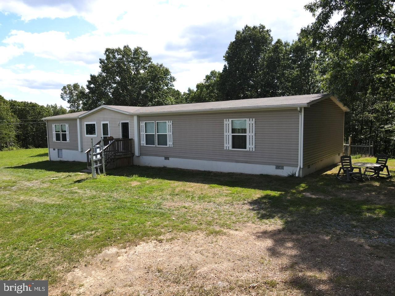 CALL NOW  TO SEE THIS OVERSIZED 4 BEDROOMS, 2 BATHROOMS, LIVING ROOM, DEN ,KITCHEN AND LAUNDRY ROOM DOUBLEWIDE HOME LOCATED IN THE COUNTRY ON 4 ROLLING AND WOODED ACRES. APPLIANCES WILL CONVEY INCLUDING REFRIGERATOR, STOVE, DISHWASHER, WASHER AND DRYER. YOU WILL ENJOY LIVING THE EASY LIFE  WHILE YOU HAVE WILD LIFE AS NEIGHBORS INCLUDING SQUIRRELS, DEER , TURKEYS AND SOMETIMES A SKUNK.  AT NIGHT WATCH THE STARS, MOON, CONSTELLATIONS, SATELLITES OR OTHER  SKY SIGHTS. COME TO WEST VIRGINIA AND BECOME A MOUNTAINEER.