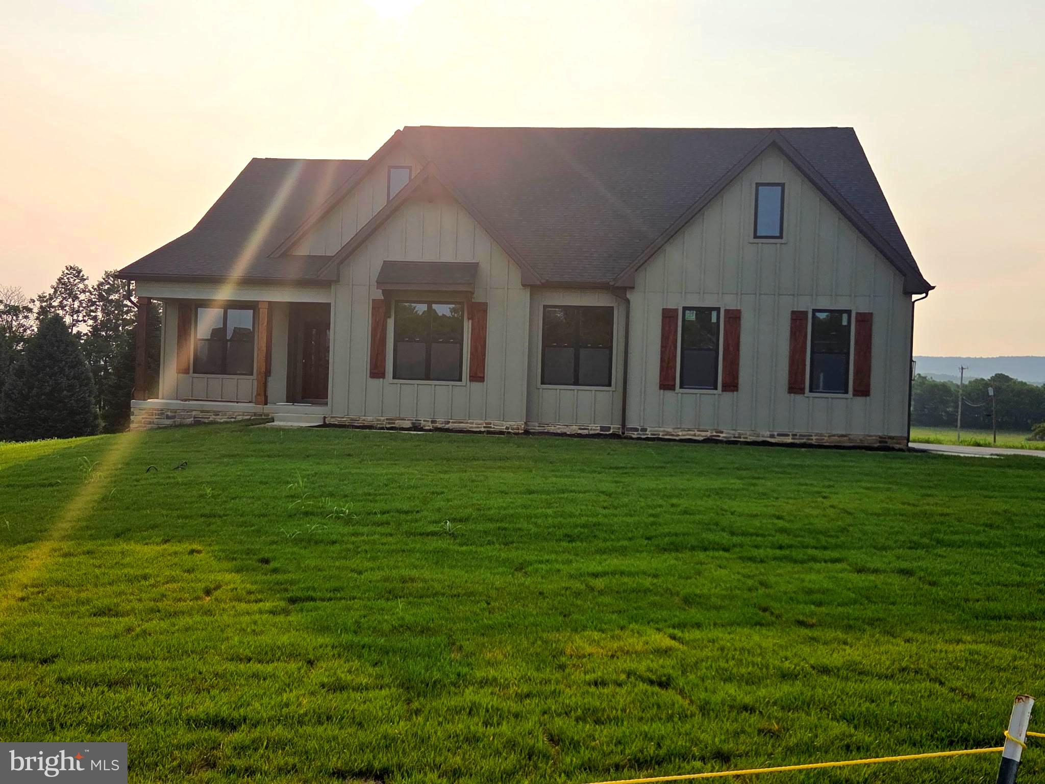 August 4th 2026 delivery!! Home with 2 + / - acres situated in the new community of Hallmark Glen!!! Impressive homes in this community offers privacy and convenience for commuters and access to amenities. This home fits perfectly and will include the following: 4 bedrooms with 3.5 baths and an office or flex room. Ranch craftsman style home with Hardie board siding and includes a 2 car garage. Quality construction nicely upgraded with full kitchen appliance package, quartz, luxury vinyl plank flooring, soft close cabinets, vaulted ceilings & more.  No deck or porch included with this attractive pricing. "Please note: The photos shown are of a similar completed home. The specific home may vary in floor plan, finishes, or upgrades. The builder reserves the right to substitute materials that may not be available to avoid delays."