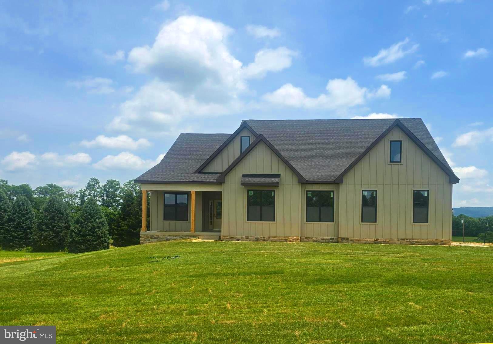 August 2026 delivery!! Home with 2 + / - acres situated in the new community of Hallmark Glen!!! Impressive homes in this community offers privacy and convenience for commuters and access to amenities. This home fits perfectly and will include the following: 4 bedrooms with 3.5 baths and an office or flex room. Ranch craftsman style home with Hardie board siding and includes a 2 car garage. Quality construction nicely upgraded with full kitchen appliance package, quartz, luxury vinyl plank flooring, soft close cabinets, vaulted ceilings & more.  No deck or porch included with this attractive pricing. "Please note: The photos shown are of a similar completed home. The specific home may vary in floor plan, finishes, or upgrades. The builder reserves the right to substitute materials that may not be available to avoid delays."