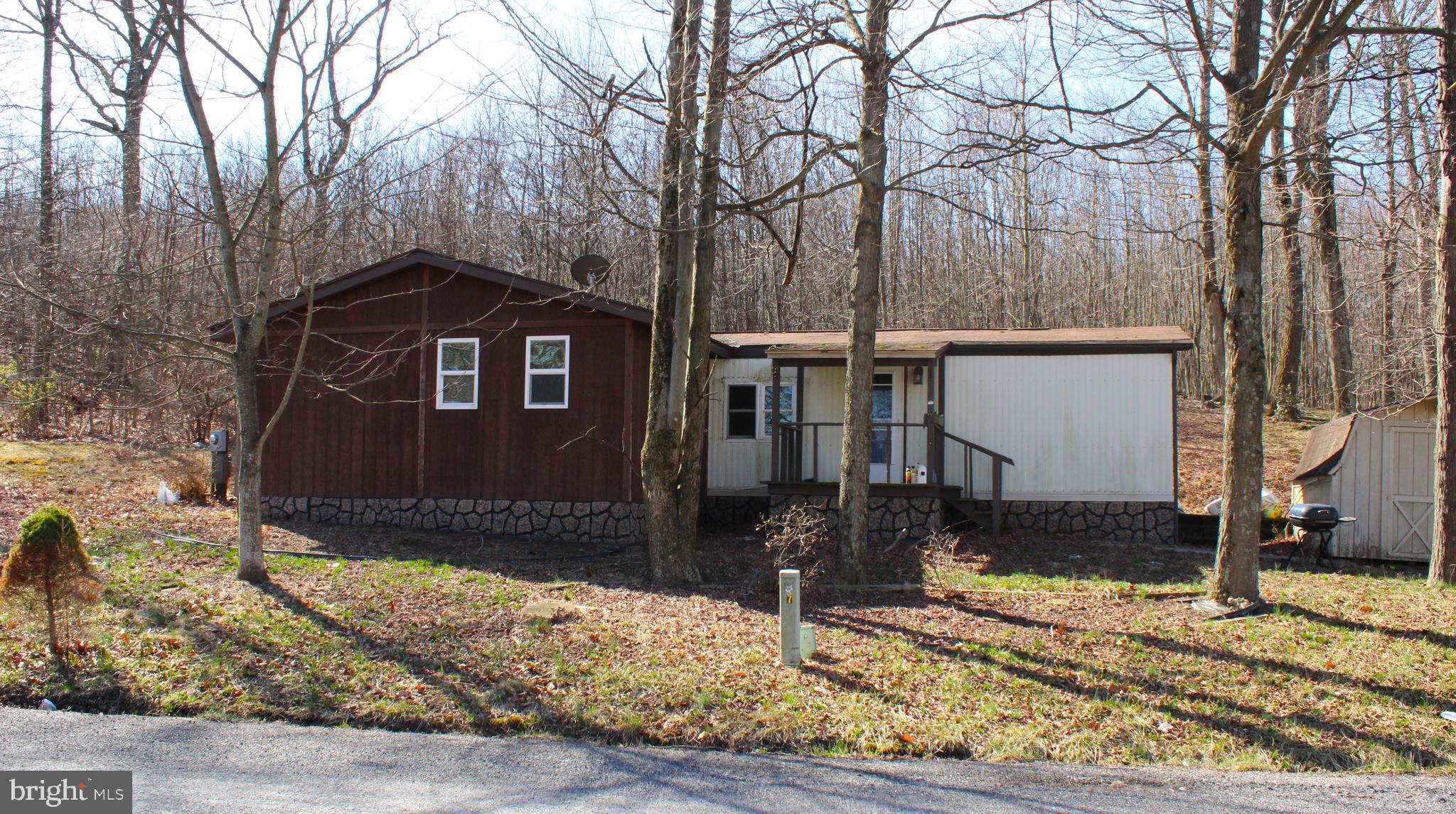 SELLER MOTIVATED AND SAYS LOOKING FOR A QUICK SALE - THIS MOBILE HOME SITS ON A RENTED LOT IN A NICE MOBILE HOME PARK.  NICE SIZE RENTED LOTS NOT YOUR TYPICAL RENTED LOTS YOU SEE IN OTHER PARKS- LOT RENT $425.00 PER MONTH PLUS $150.00 FOR WATER - SEWER & TRASH - 2 NICE SIZE BEDROOMS - 2 FULL  BATHS - POSSIBLE 3RD BEDROOM -  NICE KITCHEN WITH AMPLE CABINETS - RELAX ON THE COVERED FRONT PORCH - ONE BEDROOM IS ACTUALLY A LARGE ADDITION ADDED TO THE ORIGINAL MOBILE - NO RENT TO OWN.  THIS IS A NICE MOBILE HOME PARK NOW CALLED MORIAH PARK. NO RENT TO OWN.  DRIVEWAY