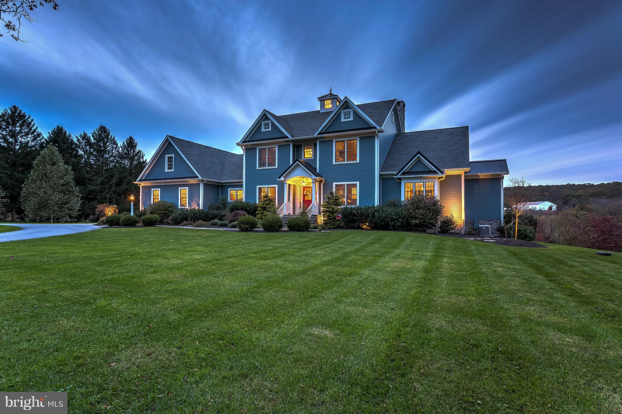Custom built home by Duerbeck in 2012 with 2 parcels consisting of 17.44 acres and all the bells and whistles one would dream of. Zoning office has approved subdivision for a 2 acre buildable lot. Geothermal heating and cooling and Generator.  First floor master suite with gas ignited wood burning fireplace and access to  trex deck.  Gourmet kitchen with coffered ceilings,  quartz counters and stainless monogram appliances.  Kitchen is open to breakfast room and family room and all have sweeping views over the pristine meadows and stream valley with a covered trex deck off of them. Dining room is spacious with a tray ceiling.  4 bedrooms upstairs with 2 full baths.  Hardwood floors all throughout.   Basement has reclaimed wood from old barn that used to be on the property with a pellet stove, full bar and walk out to patio.  The 6th bedroom is in the basement with a full bath.  3 car garage attached to house and an additional 3 car garage detached with an in law suite/apartment above.  In the law suite there is a full kitchen, living room, full bath, bedroom and washer and dryer.  Wood barn and equipment barn with outdoor shower behind the in law suite building. This is a one of kind home with the finest of details throughout.