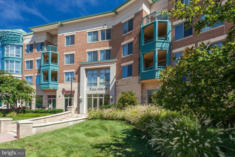 One-of-a-kind modern sophisticated Penthouse!  Open floor plan, w/ rare private elevator, unlike any other unit.  Two additional offices w/ built-ins, living room w/tray ceiling & fireplace, w/o to balcony terrace.  Gourmet kitchen w/ breakfast bar, MBR w/ custom walk-in closet.  Two underground parking spots close to the elevator.  Walking distance to downtown McLean!
