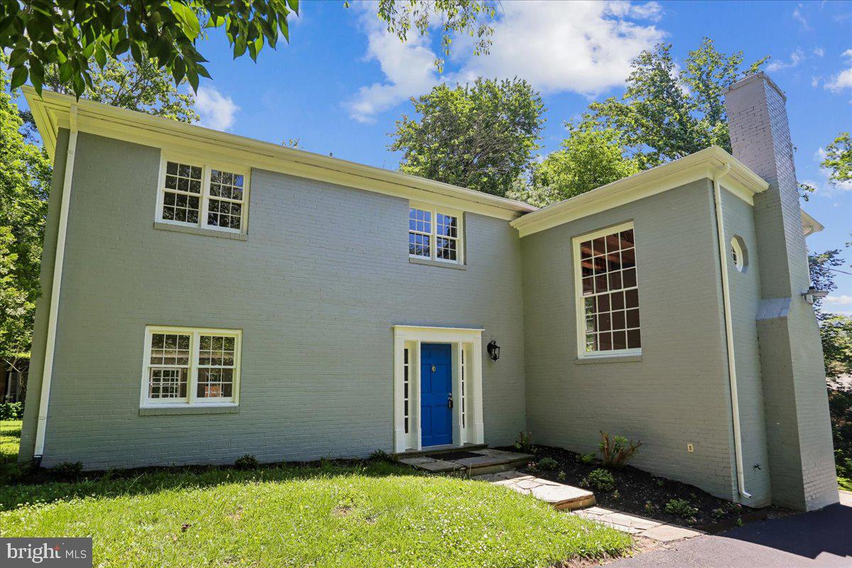 Located in the popular Meadowood community, where homes sit on large lots with great privacy, this unique custom-built mid-century modern-style home with 4 levels, 3BR, 2BA is a rare find.  It is a great entertaining home with tall ceilings, a large patio, and a super new kitchen w/guest space. The fabulous, tall great living room is a show stopper with a wood ceiling, beautiful refinished hardwood floors, and a wood-burning fireplace.  The original oak hardwood floors are newly refinished on both upper levels and shine.  A spacious flagstone entrance foyer with a closet is a desirable entrance. Leading one way to the flagstone floored separate dining room or up the steps to the Great Hall Living Room with it's Tall windows flooding it with light. 
A brand new kitchen/breakfast area and family room are around the corner with brand new stainless steel appliances.  Lots of new quartz countertops and plenty of cabinet space. You will enjoy the breakfast bar, where friends and family can join you while you finish preparations, while chatting. A well-sized breakfast area is opposite the countertop, and a large family room to the left of that.  Brand new wide plank laminate floors are featured.  
On the upper level are 3 good-sized bedrooms with refinished wood floors and 2 original 1958 bathrooms preserved to reflect the Mid-Century Modern style of this special home. The owner's suite is conveniently close to the other bedrooms, too. The whole house has been freshly painted inside and outside.  
The lower level is an unfinished laundry/utility area space with a storage room, and a door leads into the attached 1.5-2 garage.  The garage has a deck on top if it is accessed from the Great Hall living room, making it a real entertainment center with lots of fenced exterior space in a south-facing position. The lot is large with 25,400 square feet (over a half acre) and offers great privacy. There is ample exterior parking for multiple cars with two separate driveway areas.   Now on public water, there is a capped well on the lot that could potentially be reopened for uses such as watering the garden, to reduce water bills. There is a lead-free certificate for the house available in the Disclosures.   
There is a recent gas heating furnace and central air conditioning. 
The location works well if you like to be close to grocery stores (Giant is 5 minutes by car) and local restaurants.  It's not far down New Hampshire Avenue to the Beltway, while the new InterCounty Connector road connects I-95 to the East with Route 270 on the West. Route 29 is a short drive south on New Hampshire Avenue.  
Hurry by this hard-to-find custom-built home with unique features you will not find elsewhere!