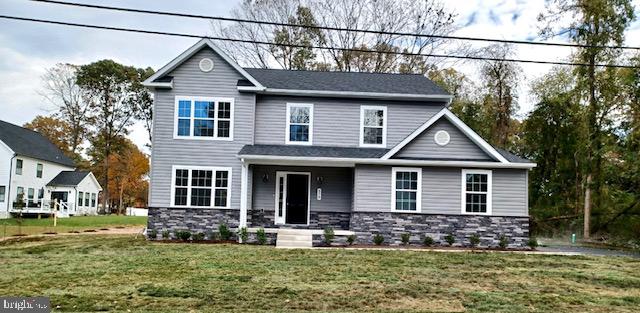 NO WAITING--THIS New Build is Available for IMMEDIATE DELIVERY!  BRAND-NEW Home has a WATERVIEW from Every Room and Every Bedroom located on the front side of the house, as waterfront homes are directly across the street!  Perfect for entertaining, the Large Family Room (with fireplace!) adjoins the chef-inspired kitchen, hosting beautiful white cabinetry!  Cherished memories await with the Grand sized kitchen island, complete with seating and upgraded granite countertops--the true "heart" of the home. 
A separate formal dining and living room also share this main level floorplan.  OR, make use of one of the rooms as a home office or playroom!  Upstairs, the Primary Bedroom is a true retreat, featuring a spacious walk-in closet. The spa-like primary bathroom with dual vanities, large soaking tub AND separate custom tiled shower are so inviting!   Let's not forget about the 3 Generous sized Secondary Bedrooms, sharing another tastefully designed bathroom and featuring a decorative accent window to allow for natural light.  The details throughout this house do not go unnoticed! Need more space??  The full basement is MASSIVE and awaits your vision, and a 3 piece bathroom plumbing rough in is already present.  There's plenty of parking with the 2 car side load attached garage and large driveway.  This home sits upon a large, flat and usable .34 acre parcel, so definitely some elbow room between neighbors!  The communities among Point Pleasant attract boaters and water lovers alike and waterfront restaurants are within walking distance.  NO HOA!  But there's more!  Builder is offering $10,000 towards a Buy-Down Rate or Closing Help!