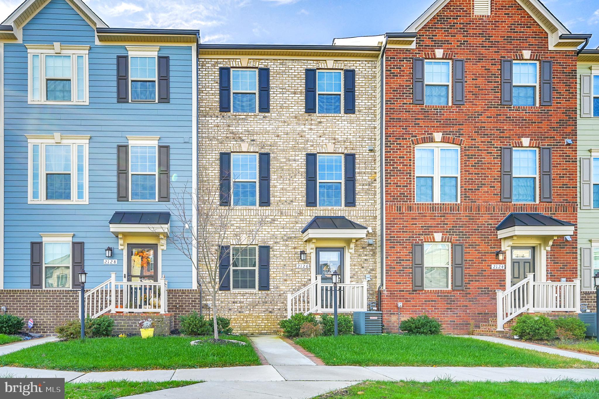Don't miss out on this beautiful, professionally managed, townhome in popular Potomac Shores neighborhood ready for new tenants! Numerous neighborhood amenities including pools, sport courts, club house, fitness barn, available golf membership and much more. FIOS 100/100 included with rent! Fantastic placement in the neighborhood with a courtyard style front entrance serviced by the two car garage, accessed from alley behind home giving you more green space out front. Head into inviting foyer with hard wood floors leading to a large bonus room great for a sitting room, office, den or gym as well has powder room and access to garage entry. Head up to the main floor boasting open floor plan with gourmet kitchen as centerpiece flanked by large family room on one side and dining area with built in's on other side all with loads of natural light and solid hardwood floors throughout. Head up to bedroom level to 2 ample sized auxiliary bedrooms, hall bathroom with tub/shower, upper level laundry and massive master bedroom with tray ceilings, walk in closet and attached 3 piece bathroom with his and her sinks, large soaking tub and stall shower. Both accent walls have been painted neutral colors. Dogs allowed and handled case by case. Professionally managed and available for up to a 36 month term! Call today for your private showing. Accent walls have been painted to match rest of walls in Family room and master bedroom.