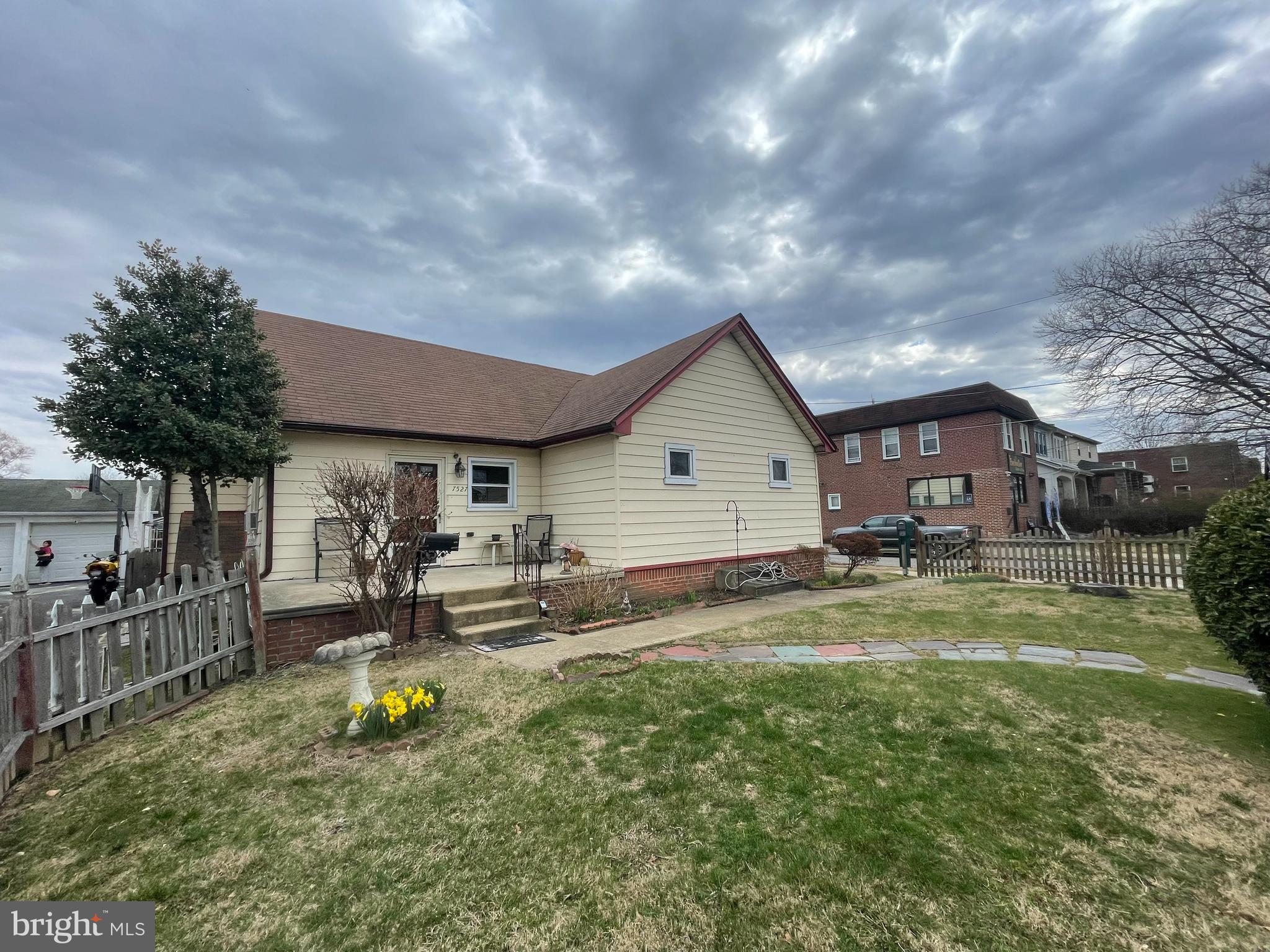 Single converted and zoned as two family unit with a 2 car detached garage with 2 car driveway parking. This corner property could be used by a large family or rented out by owner occupant or investor.
Unit 1 is the front half with concrete porch, 1 bedroom with finished basement. First floor set up as living room, bedroom with full bathroom and closet, large kitchen with window box looking out to fenced yard. Finished basement set up as family room, bedroom,  full bathroom, utility room at front and washer and dryer at rear. 
Unit 2 is the rear half with 1 bedroom, living room, hall bathroom, eat in kitchen and stairs to finished 2nd floor which could be used as a bedroom or office and door to a floored attic for extra storage.
Unit 1 has door in kitchen to access fenced in yard and patio.
2 boilers/radiator heat delivery and 2 gas water heaters.
Solar panels are leased and buyers will need to sign contract with solar company.